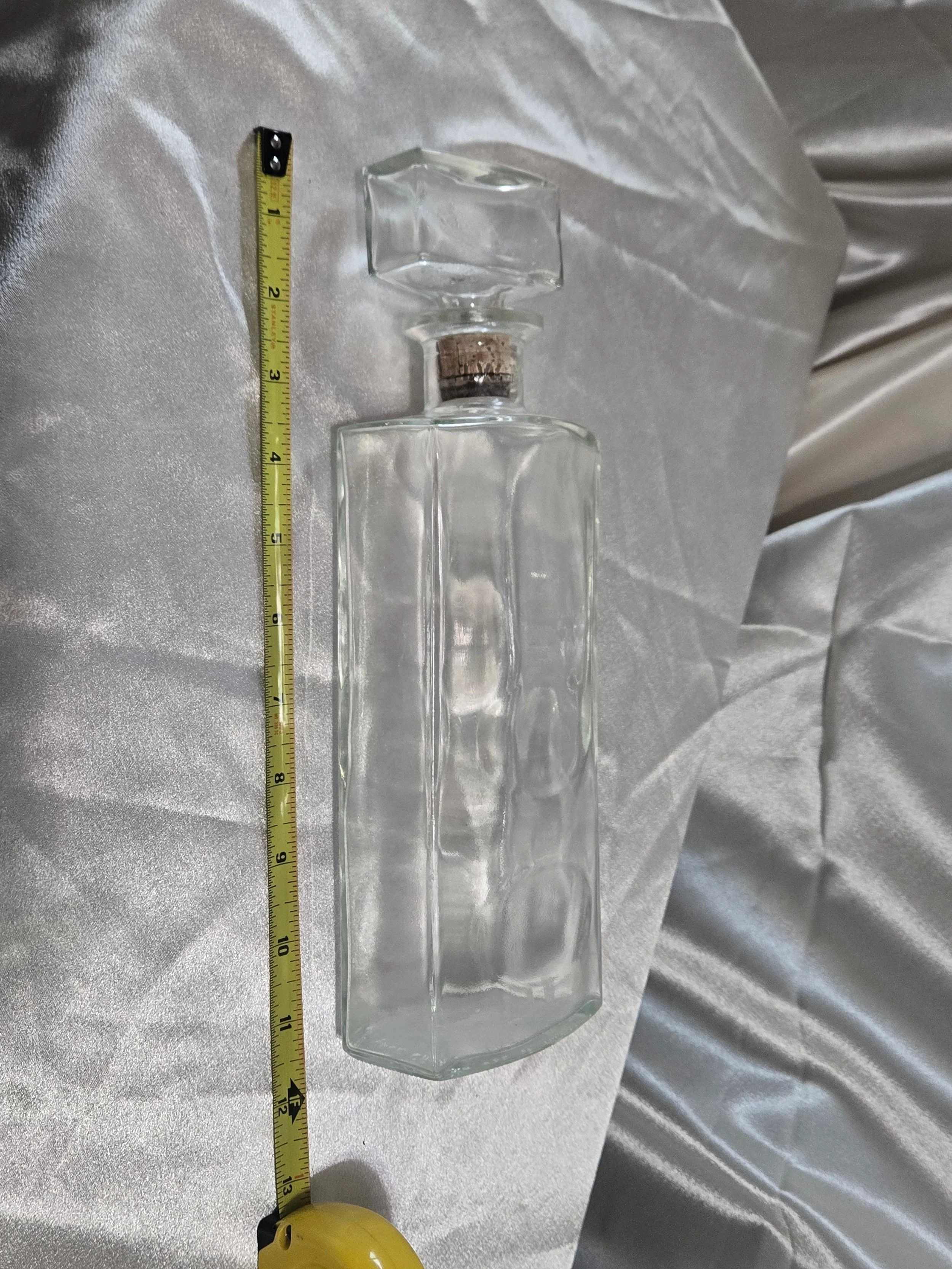 IW Harper clear glass decanter with stopper, front view