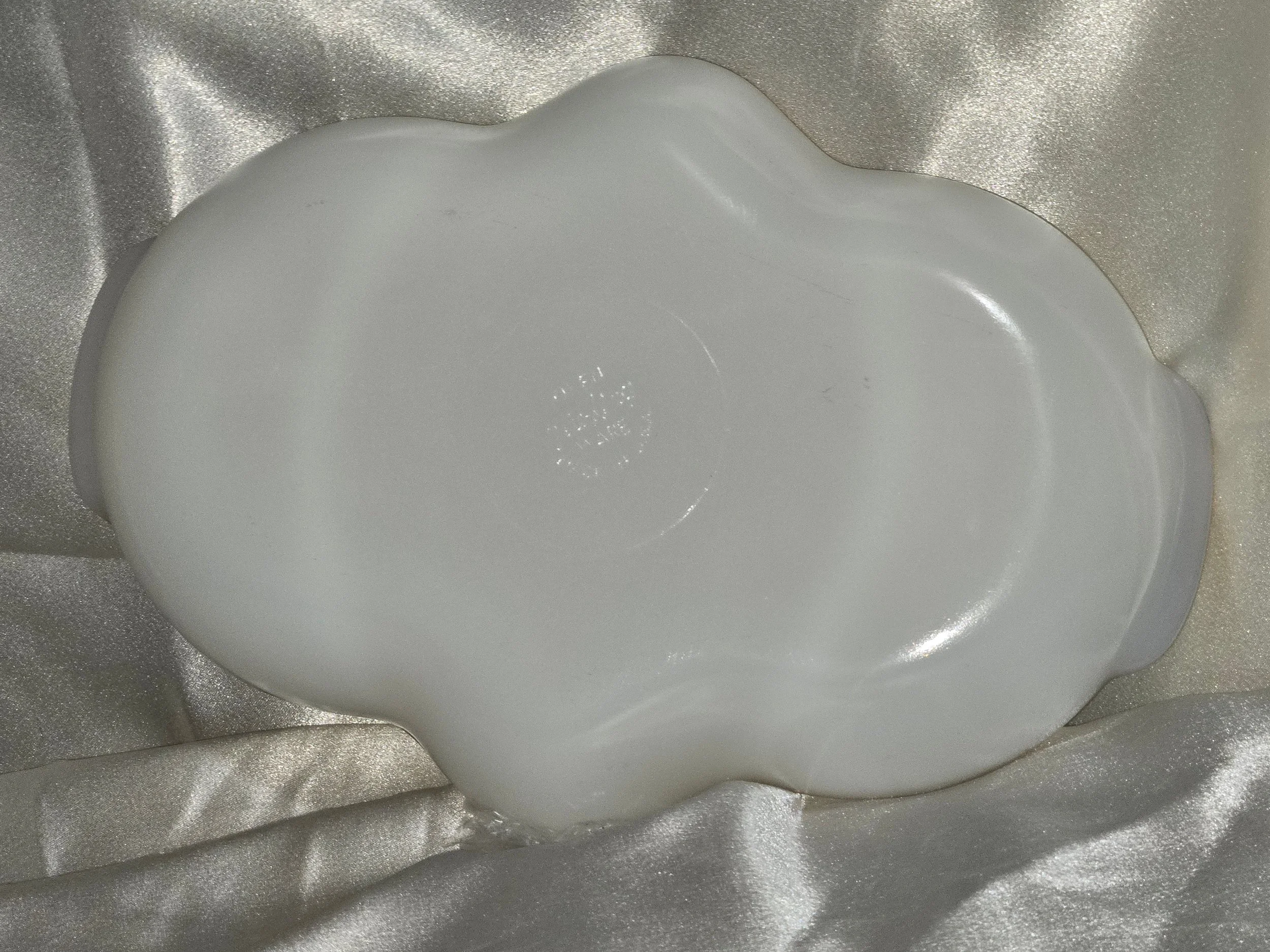 Backside of white Fire King relish tray with gold trim