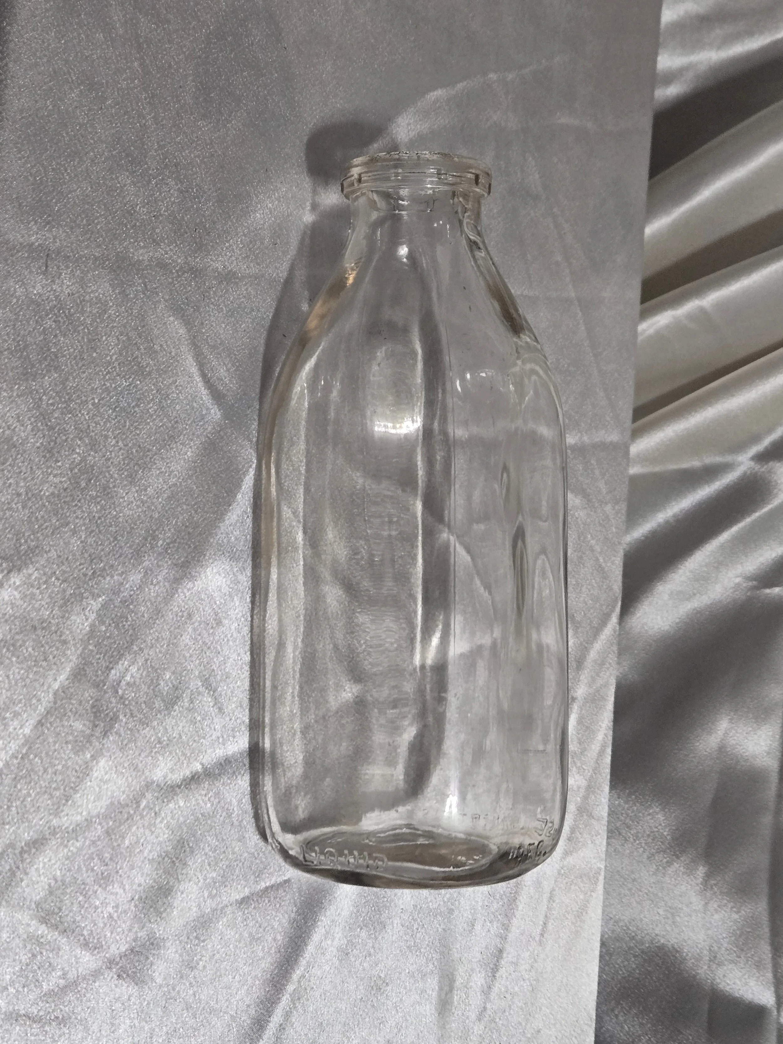 Retro glass milk bottle decor, collectible vintage