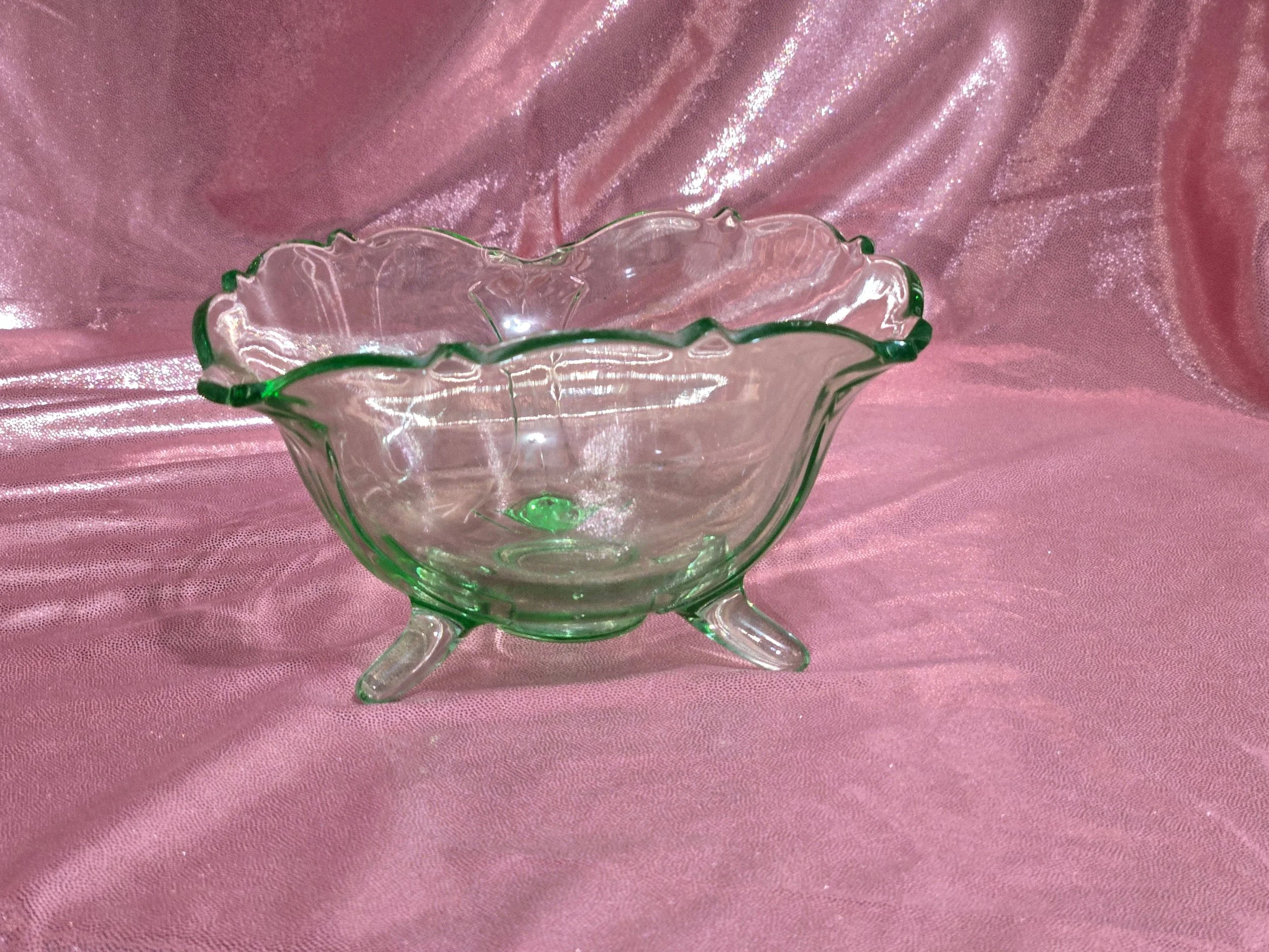 Scalloped uranium glass bowl with footed base