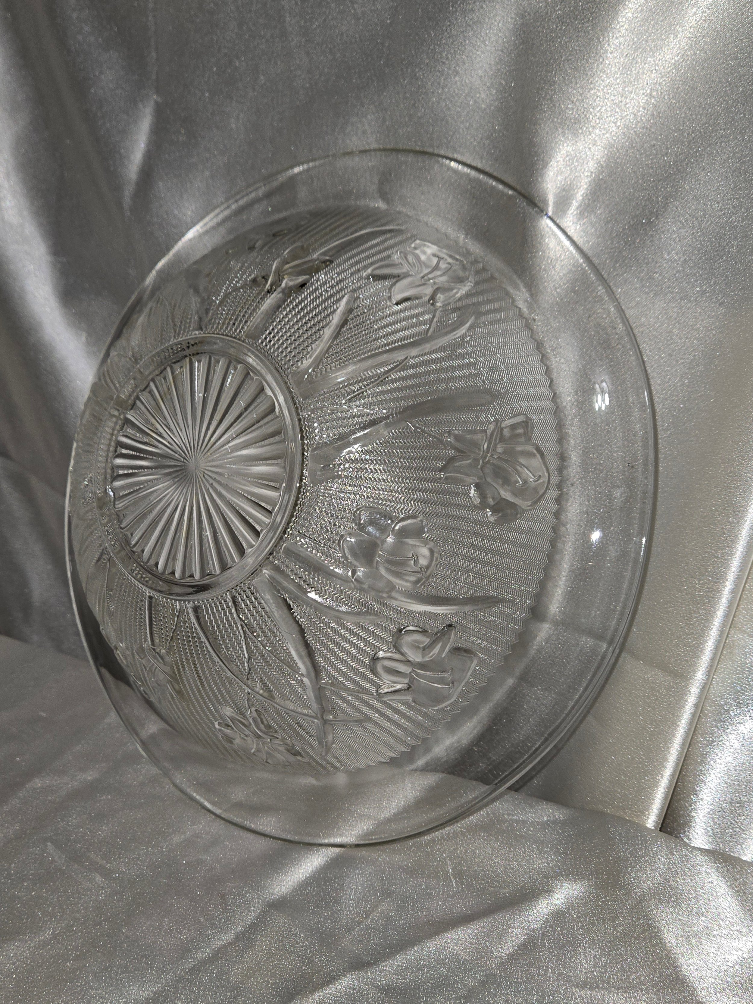 Close-up of iris floral detail on Jeannette Depression glass bowl