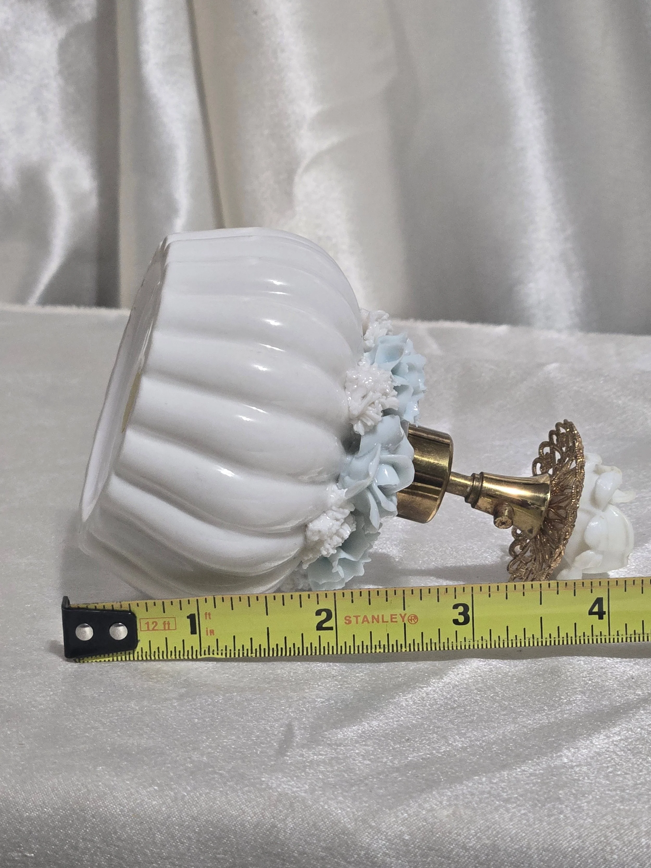 Side view of vintage perfume bottle display