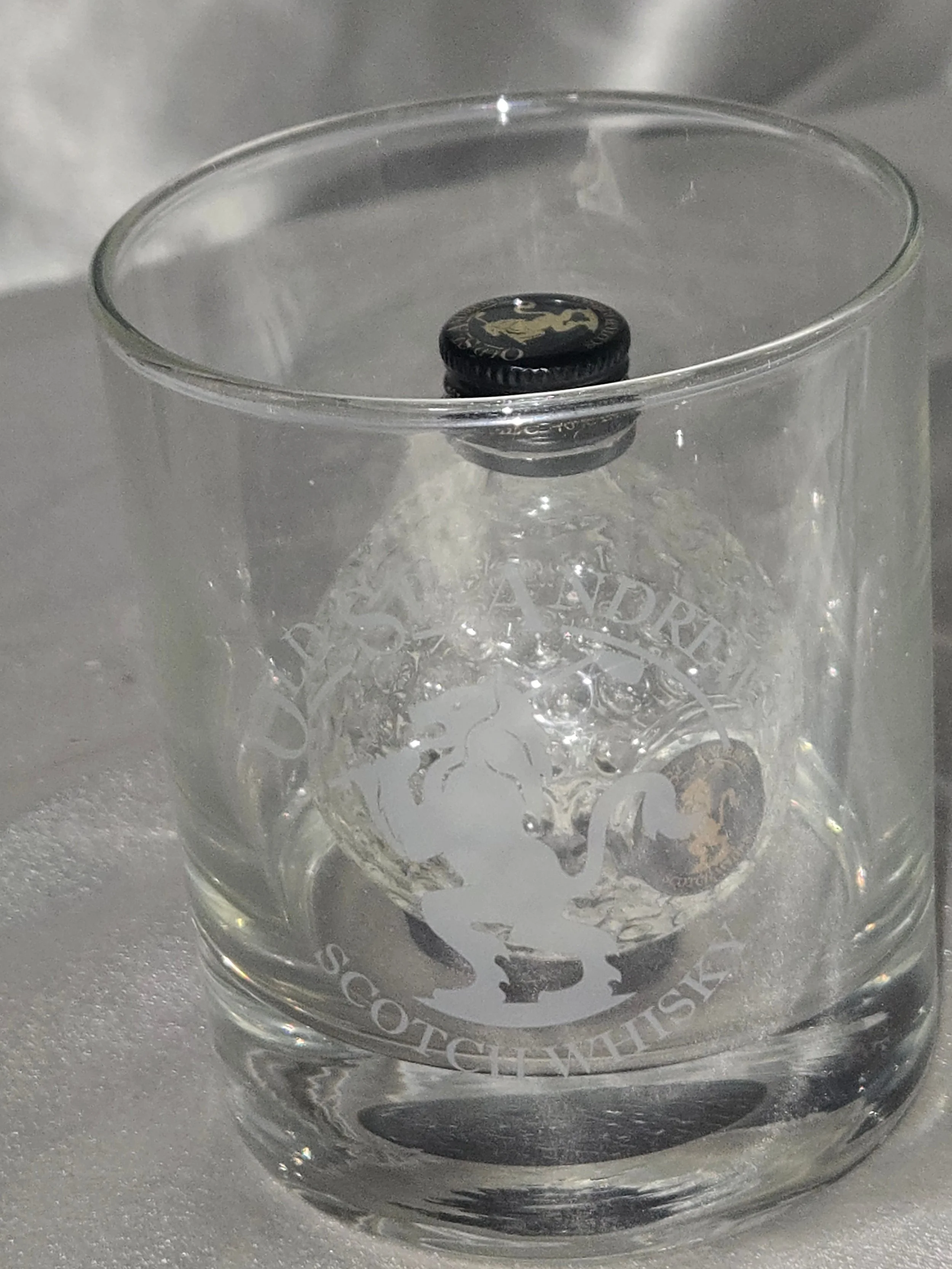 Old St. Andrews “Clubhouse” golf ball whisky bottle in glass out of packaging