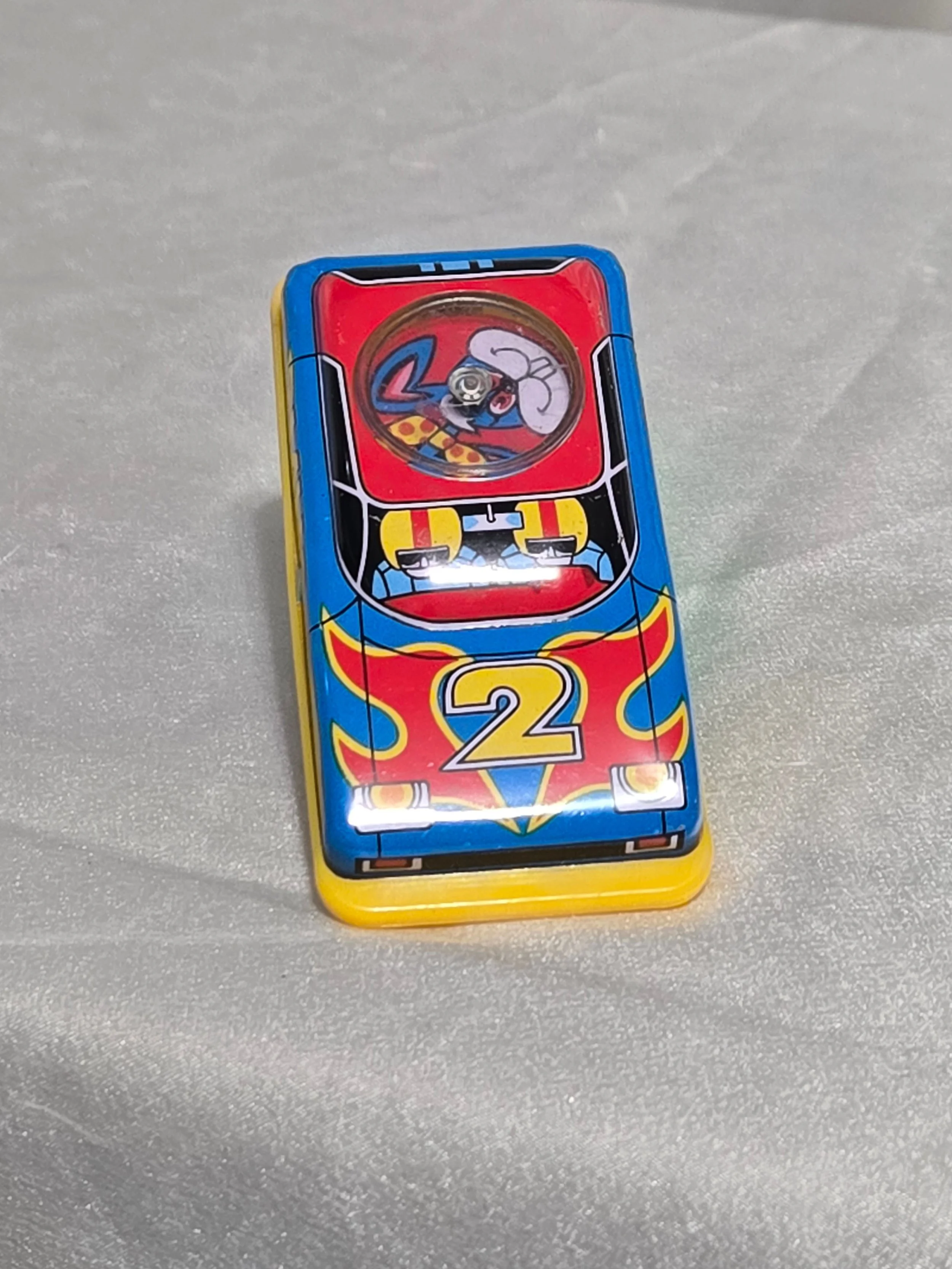 Colorful vintage tin toy cars top view