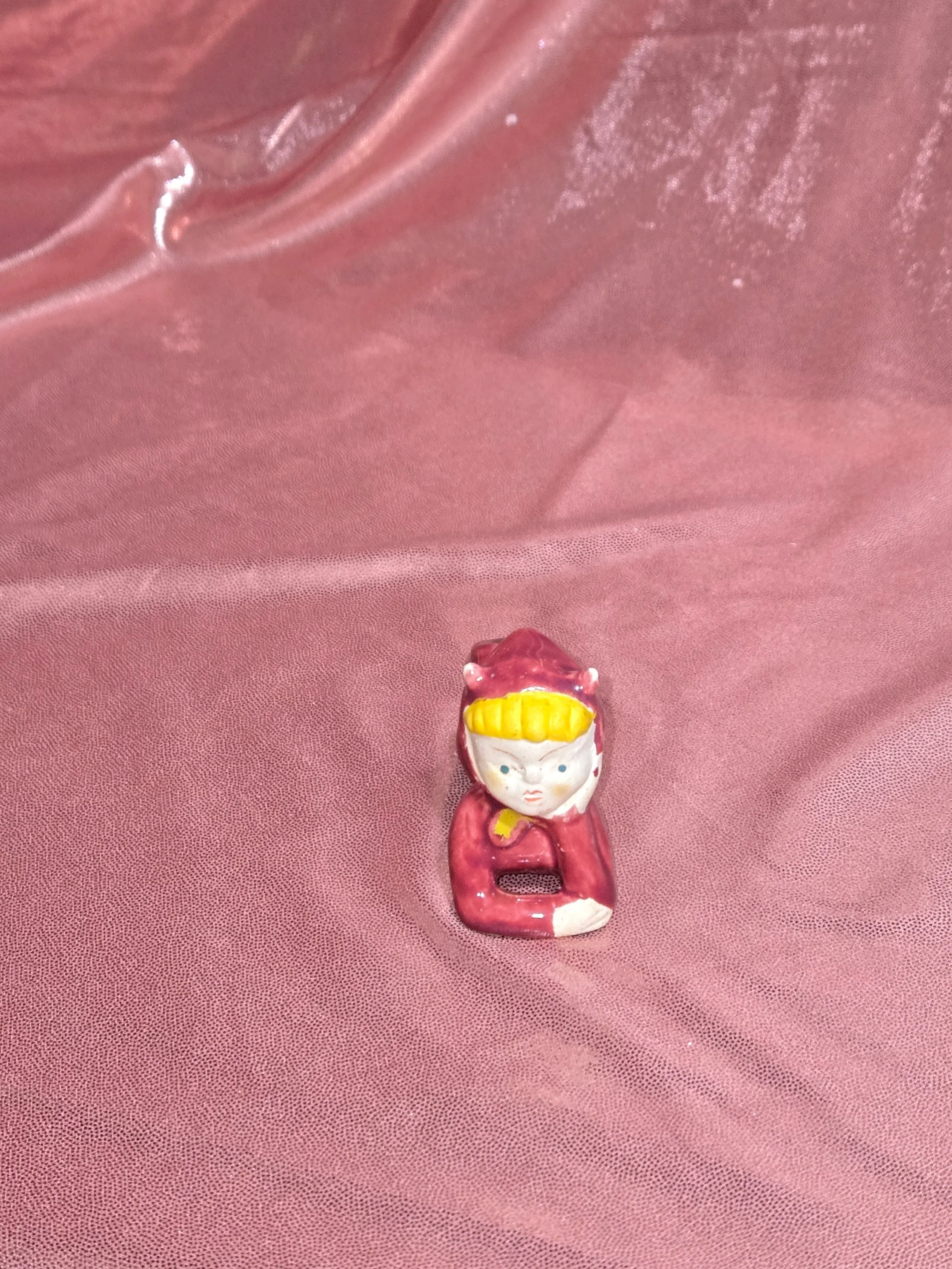 Ceramic imp figurines with expressive faces