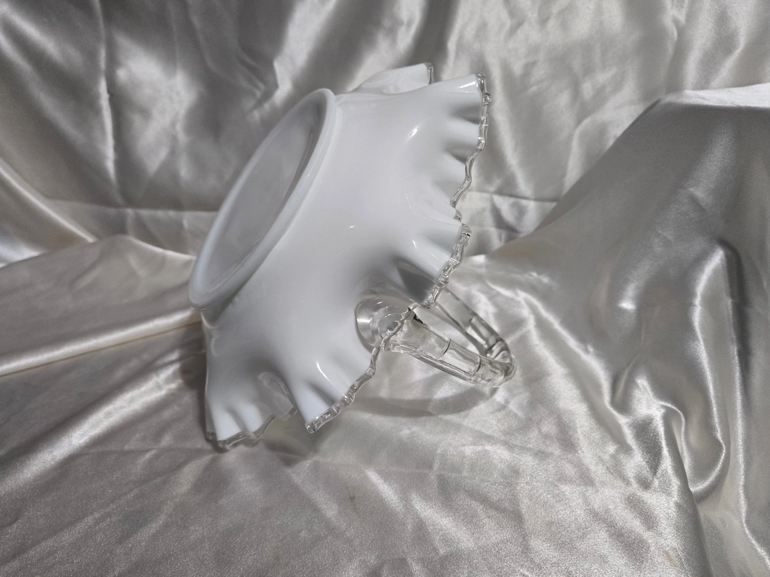 Vintage Fenton-style clear glass bowl featuring etched floral pattern and crown motif with visible handle repair.