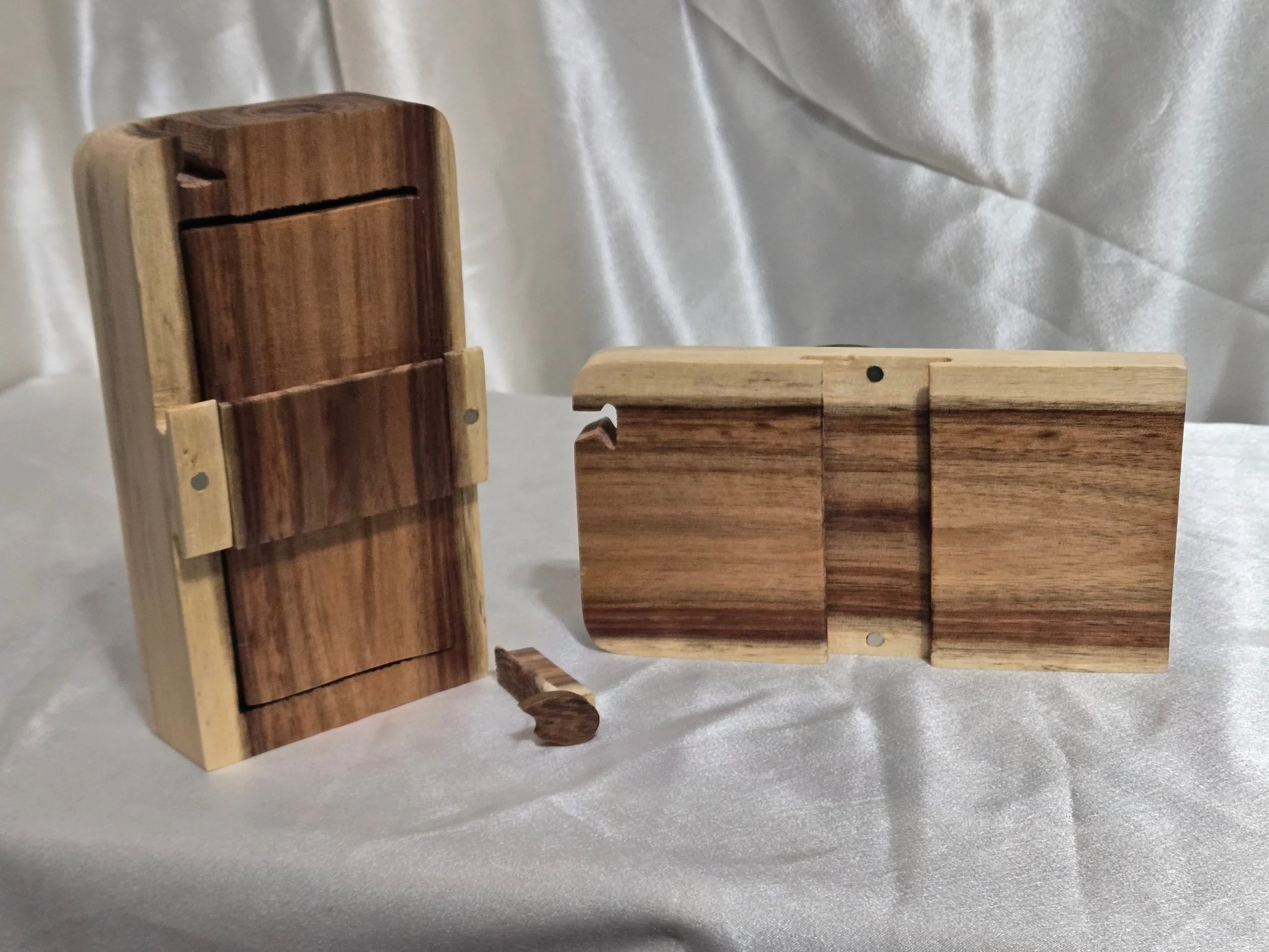 Wooden panda and cub puzzle box closed showing layered wood design