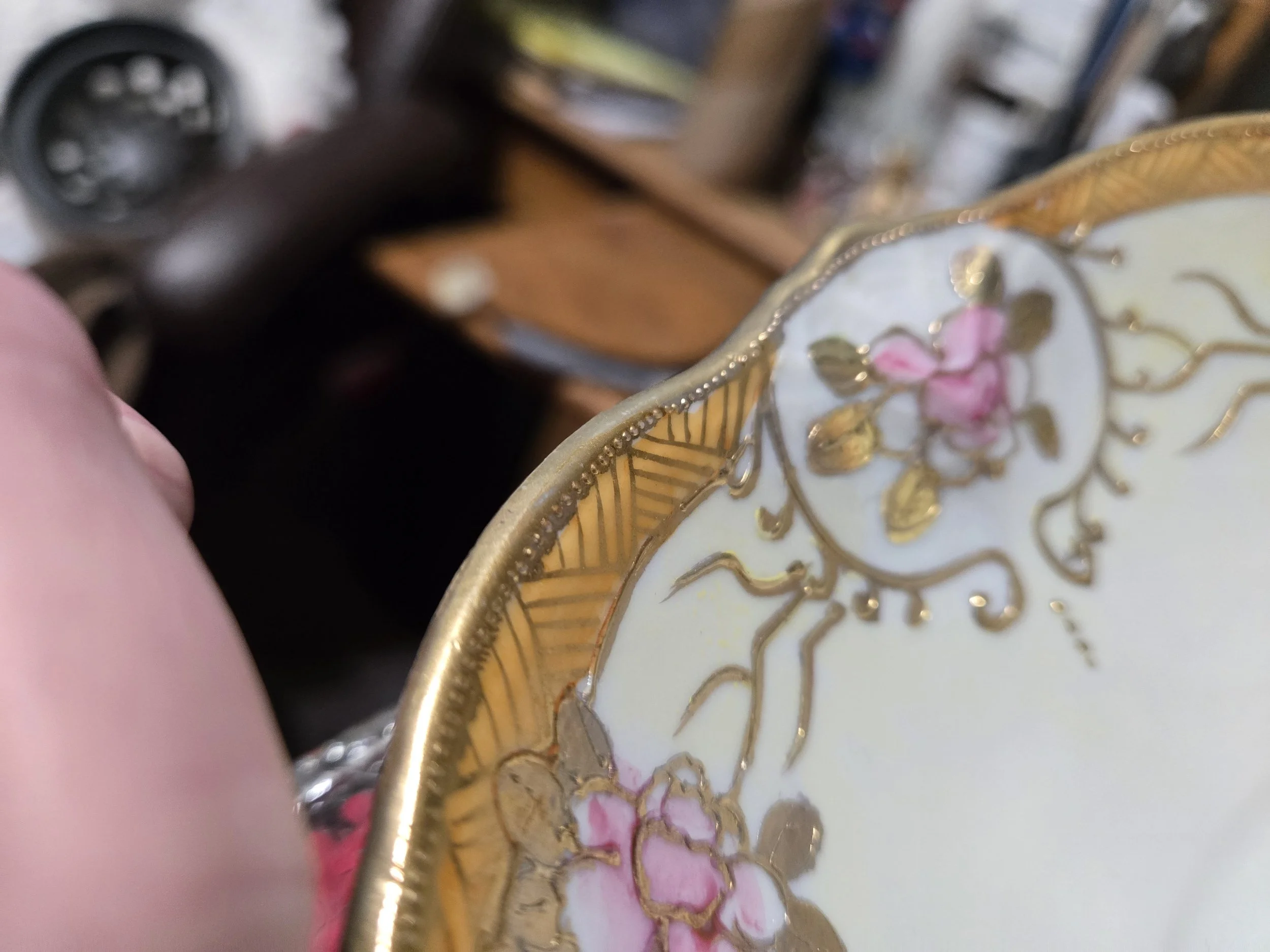 Bibi Nippon porcelain bowl detail showing hand painted flowers and scalloped gilt rim