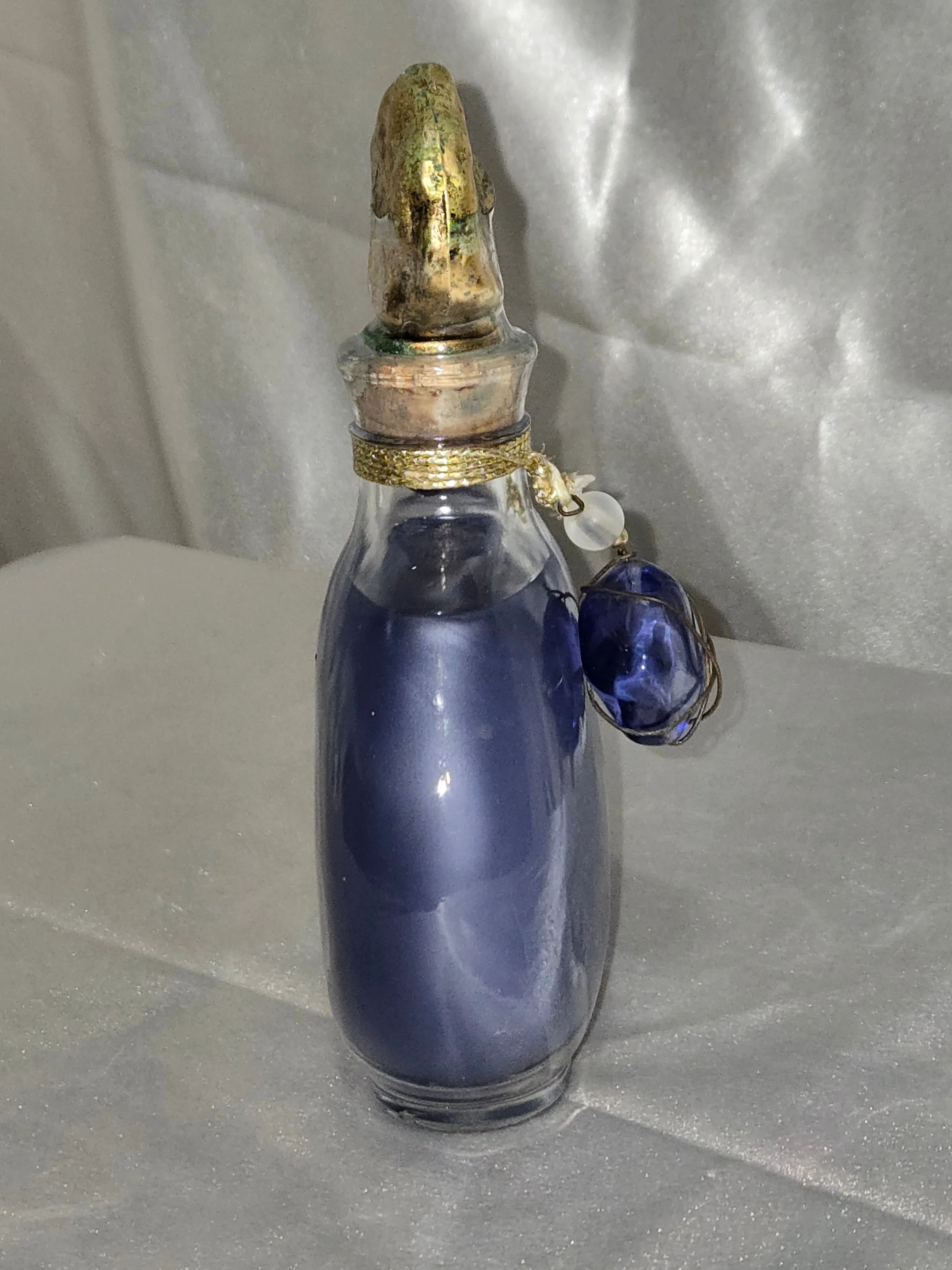 Vintage Lalique style perfume bottle side view