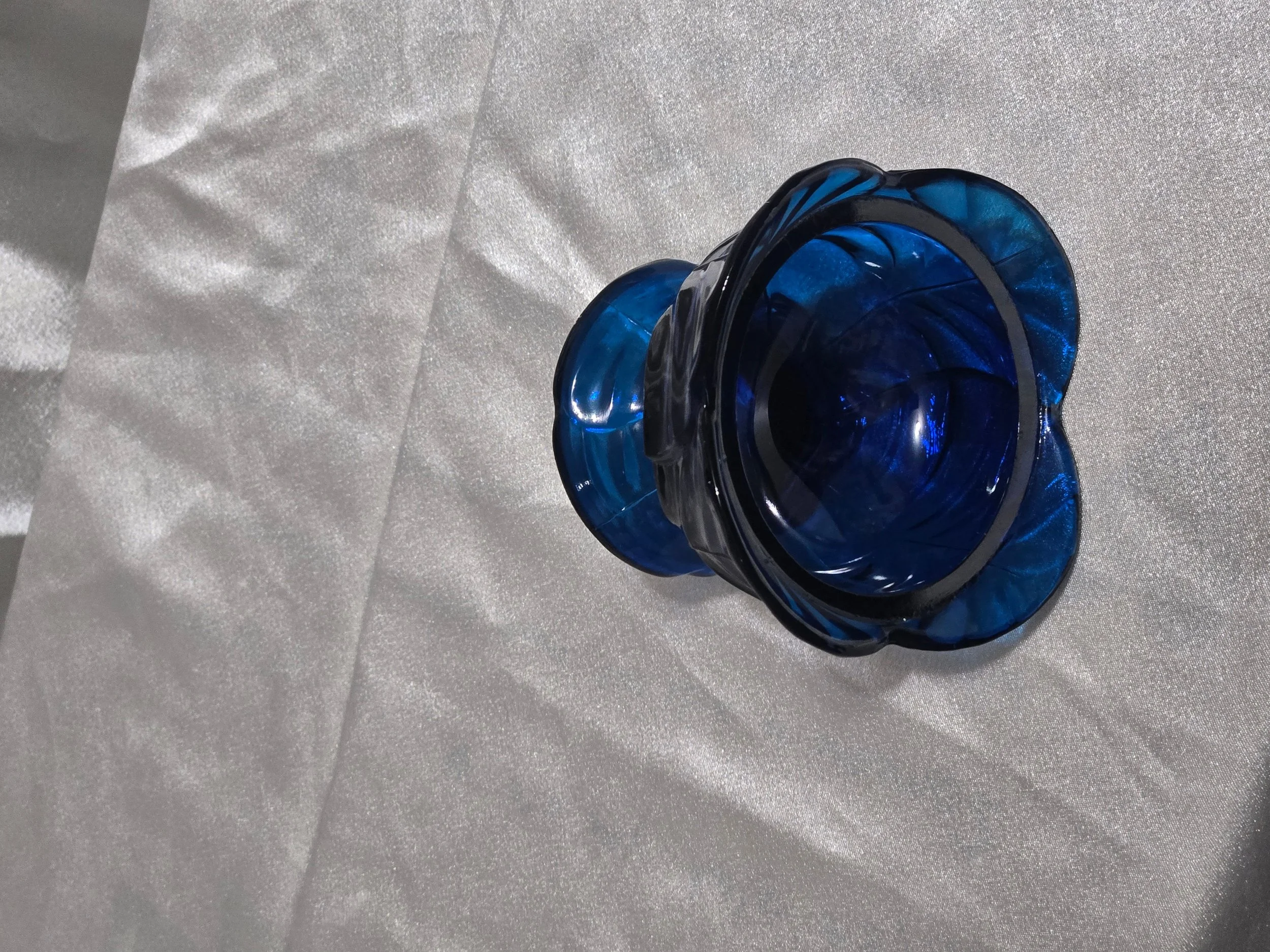 Viking Glass Glimmer Leaf fairy lamp base in charcoal blue pressed glass with leaf pattern and rounded form, mid-century vintage decorative piece.