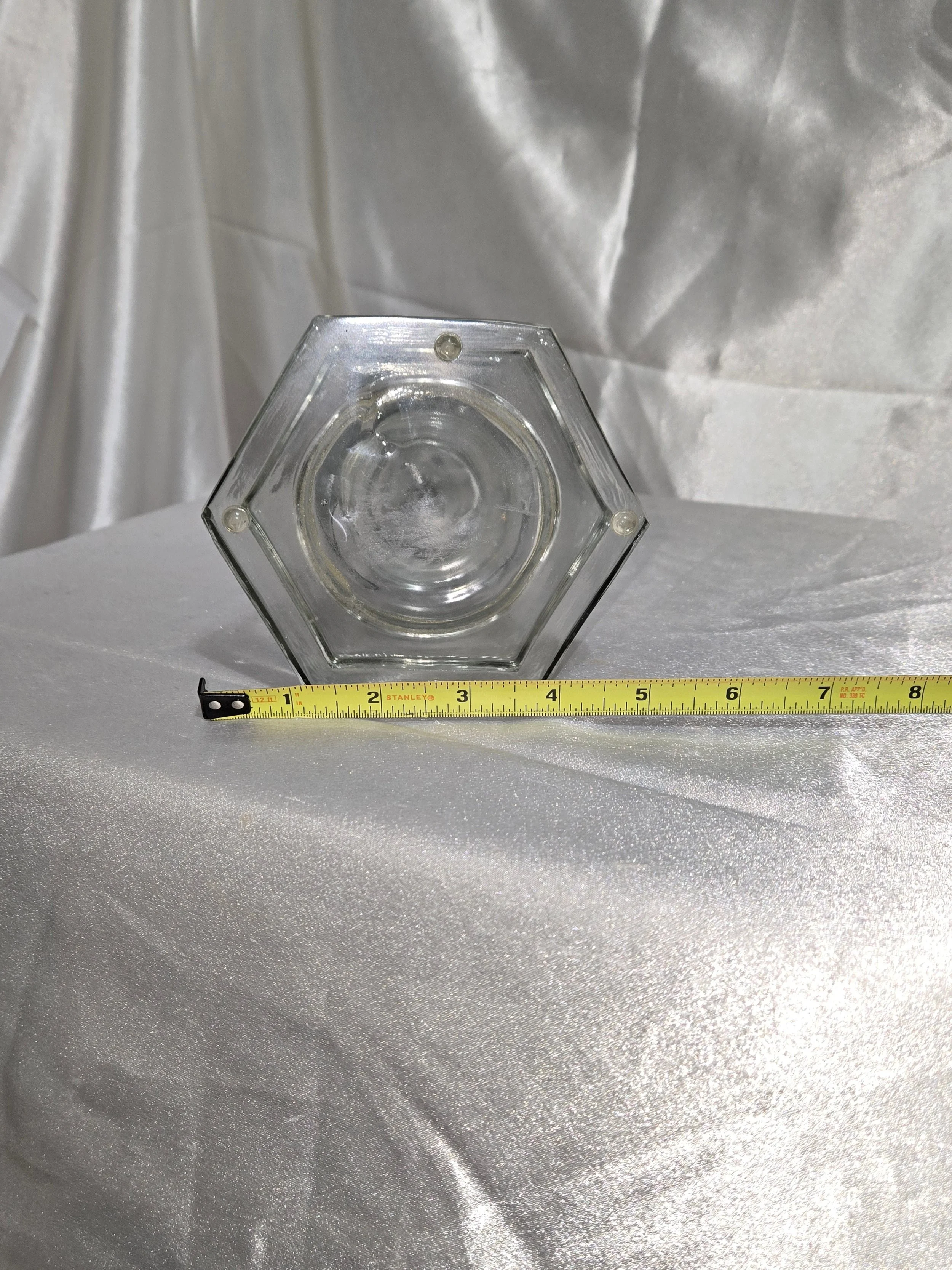 Clear glass taper candle holder with wide base
