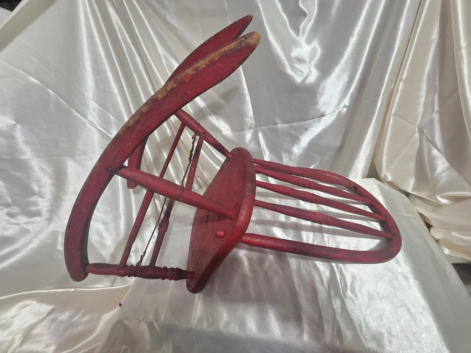 Close-up of curved rocker base and spindles
