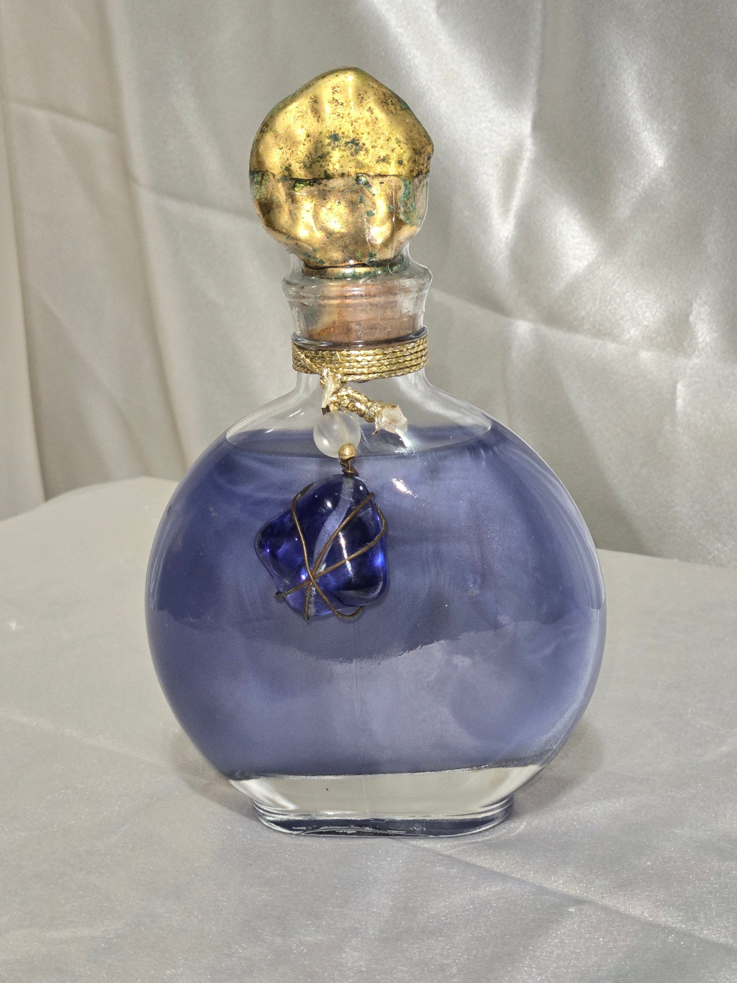 Blue art glass perfume bottle with decorative stopper