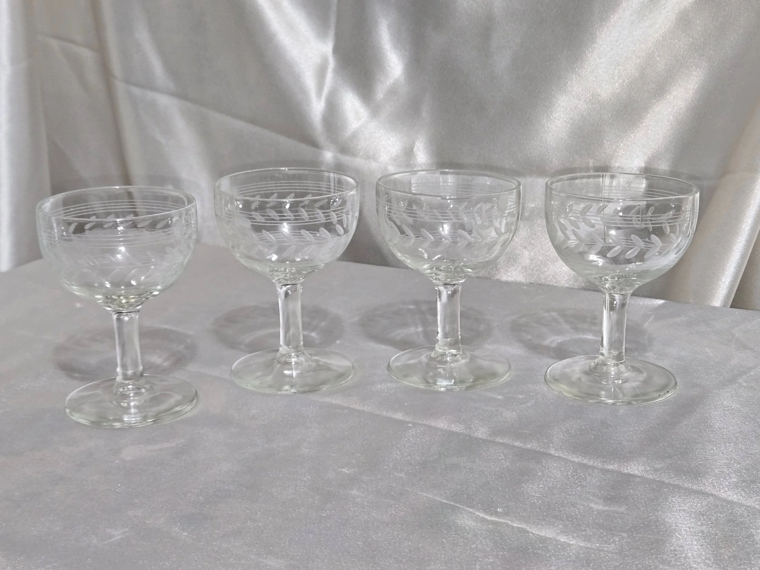 Single Anchor Hocking etched coupe glass showing mid century pressed glass detail