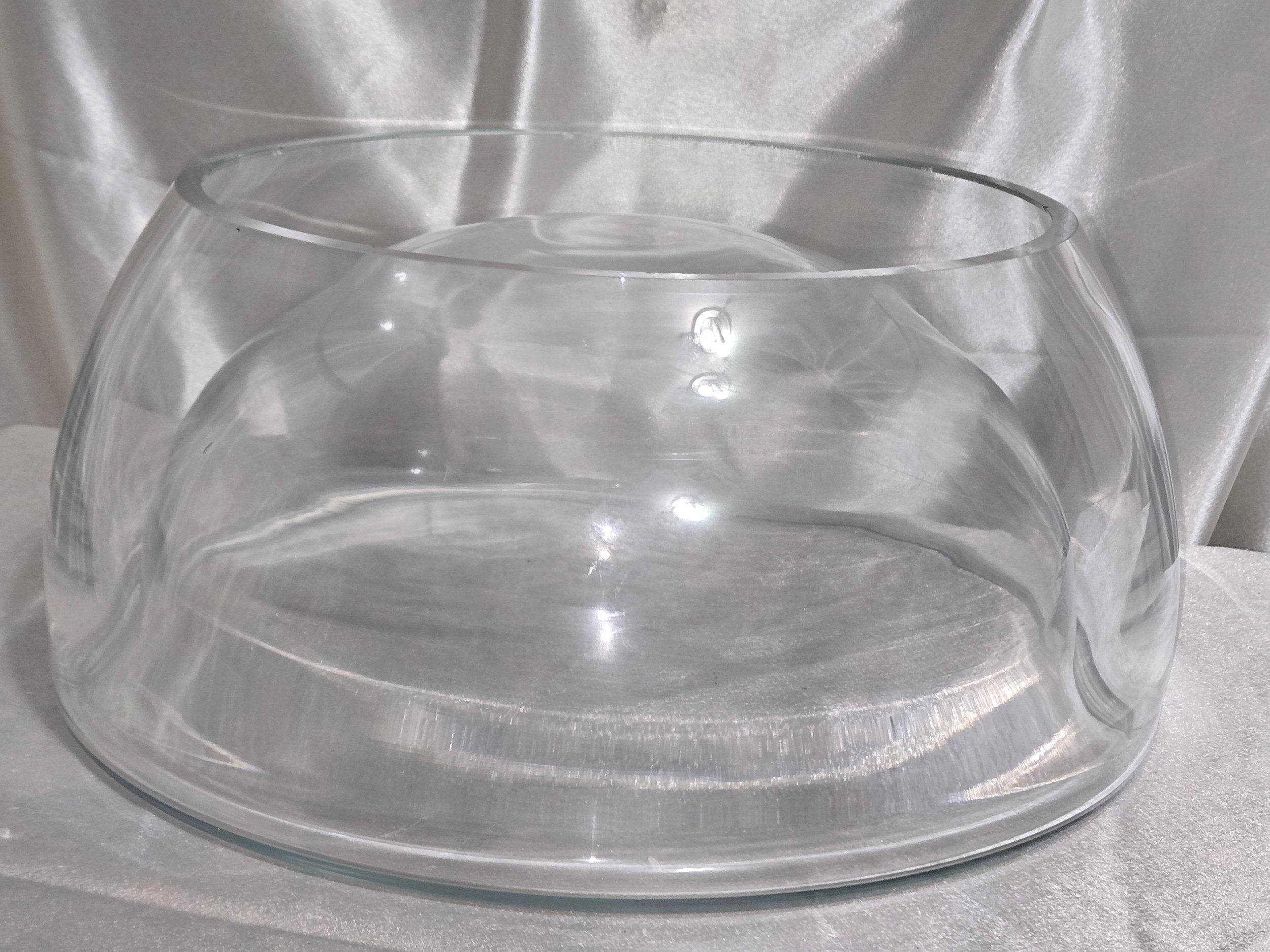 Reversible glass bowl shown inverted highlighting double wall design