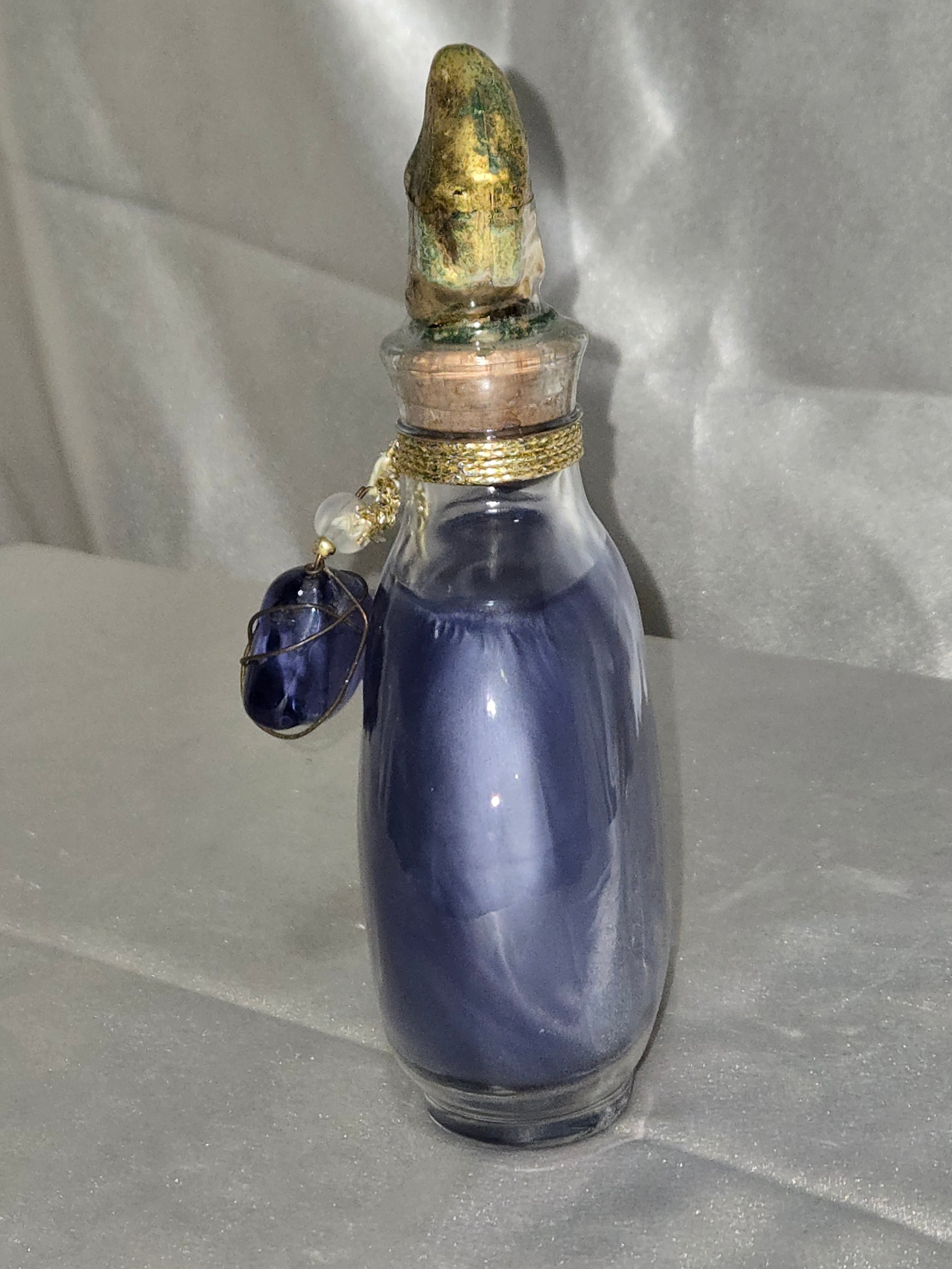 Vintage Lalique style perfume bottle side view