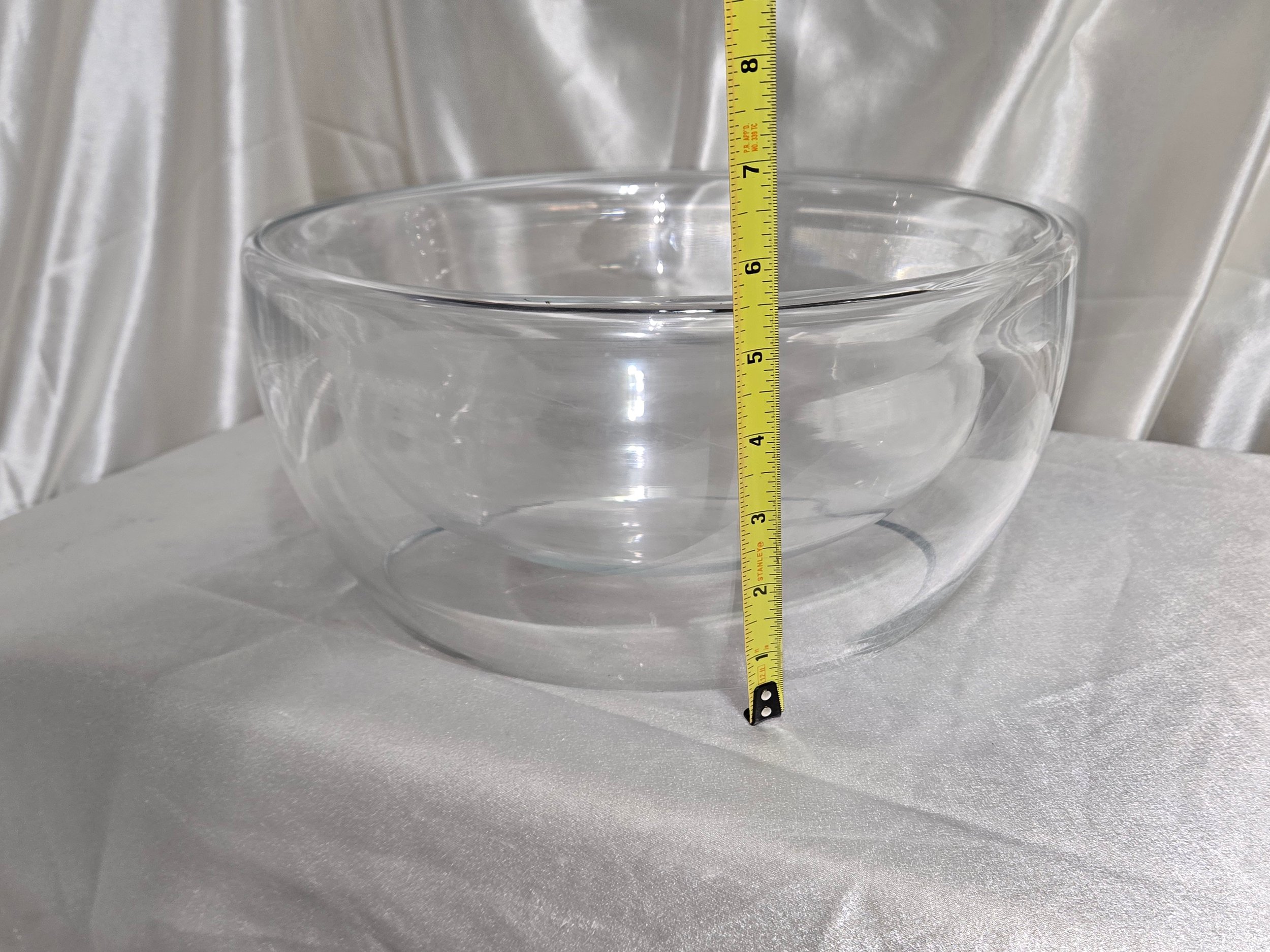 Side view of reversible concave convex glass bowl with height measurement