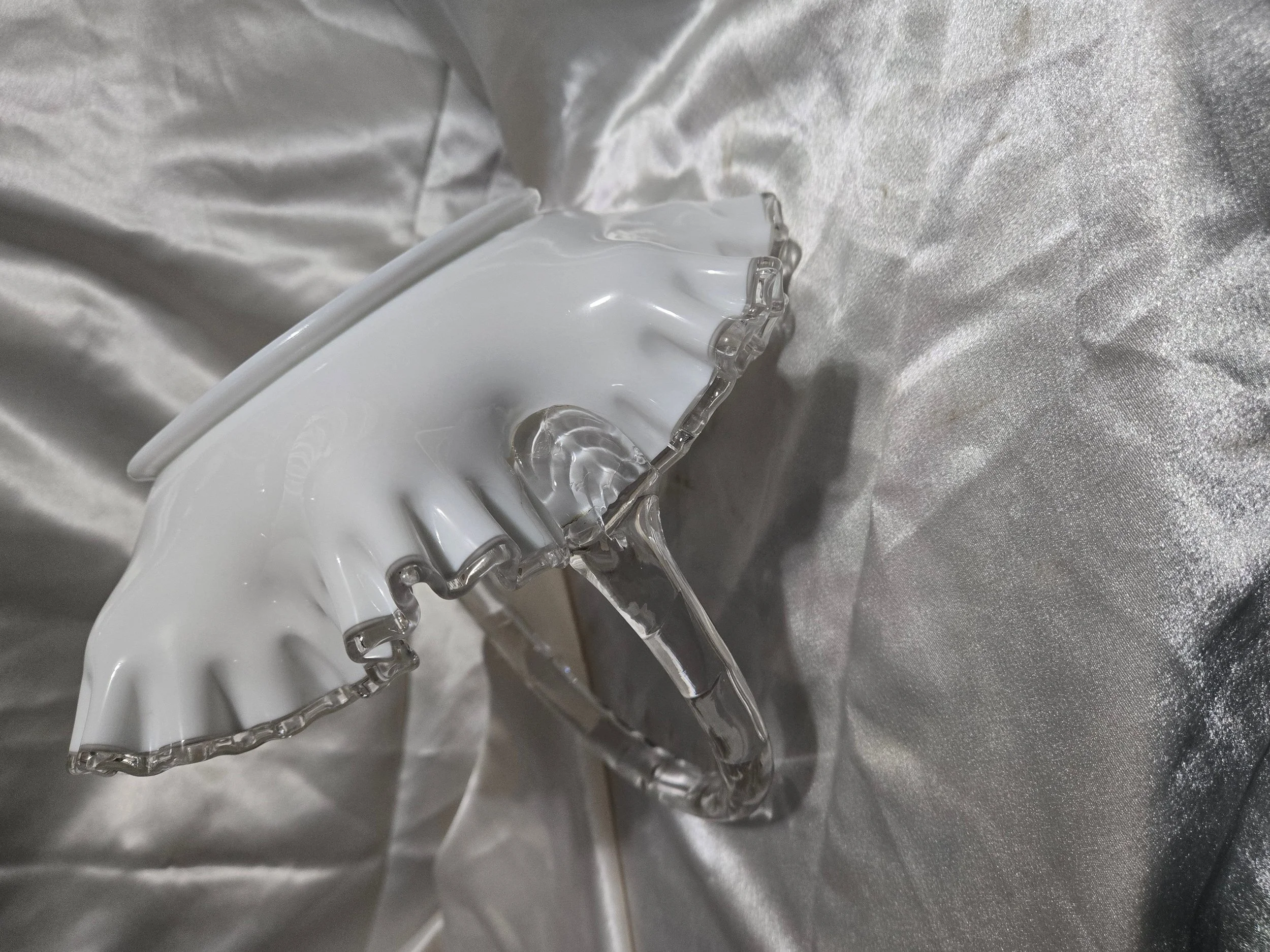 Vintage Fenton-style clear glass bowl featuring etched floral pattern and crown motif with visible handle repair.