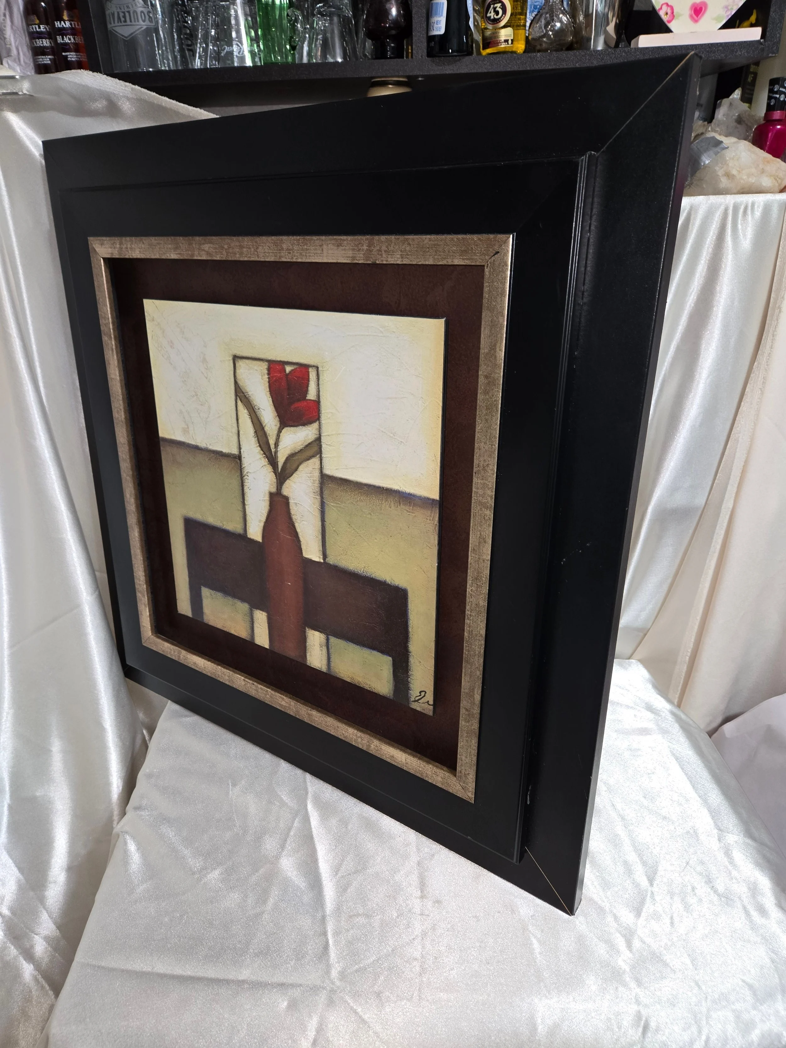 Framed signed art print by Eve Shipritser featuring a neutral still life scene.