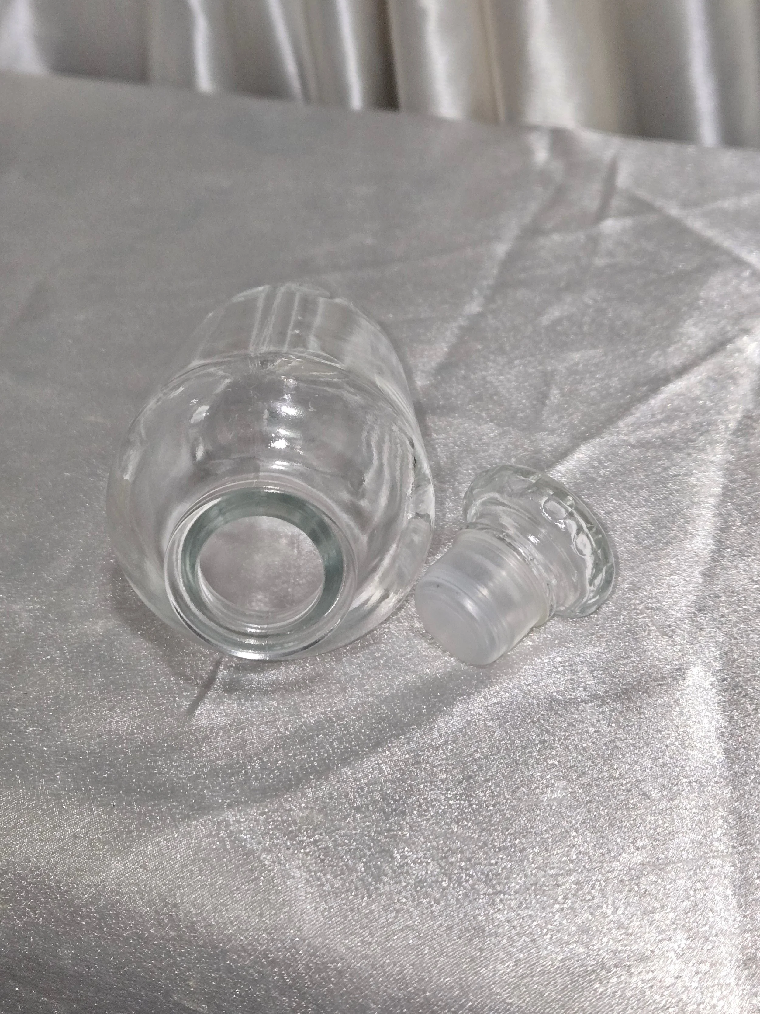 Apothecary style glass bottle with fitted lid