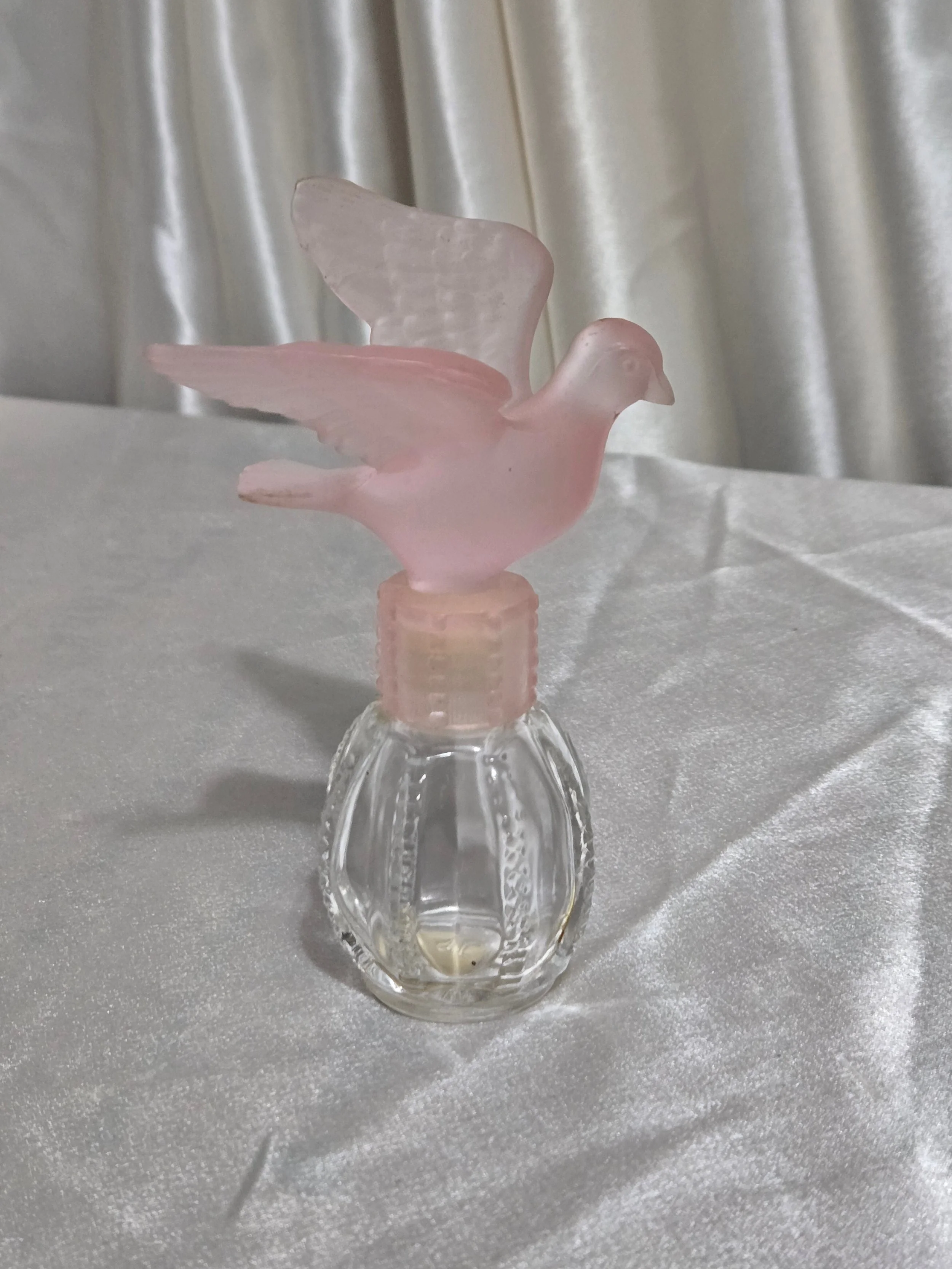 Vintage Avon Delager Royal dove perfume bottle with frosted pink glass dove stopper and clear ribbed base