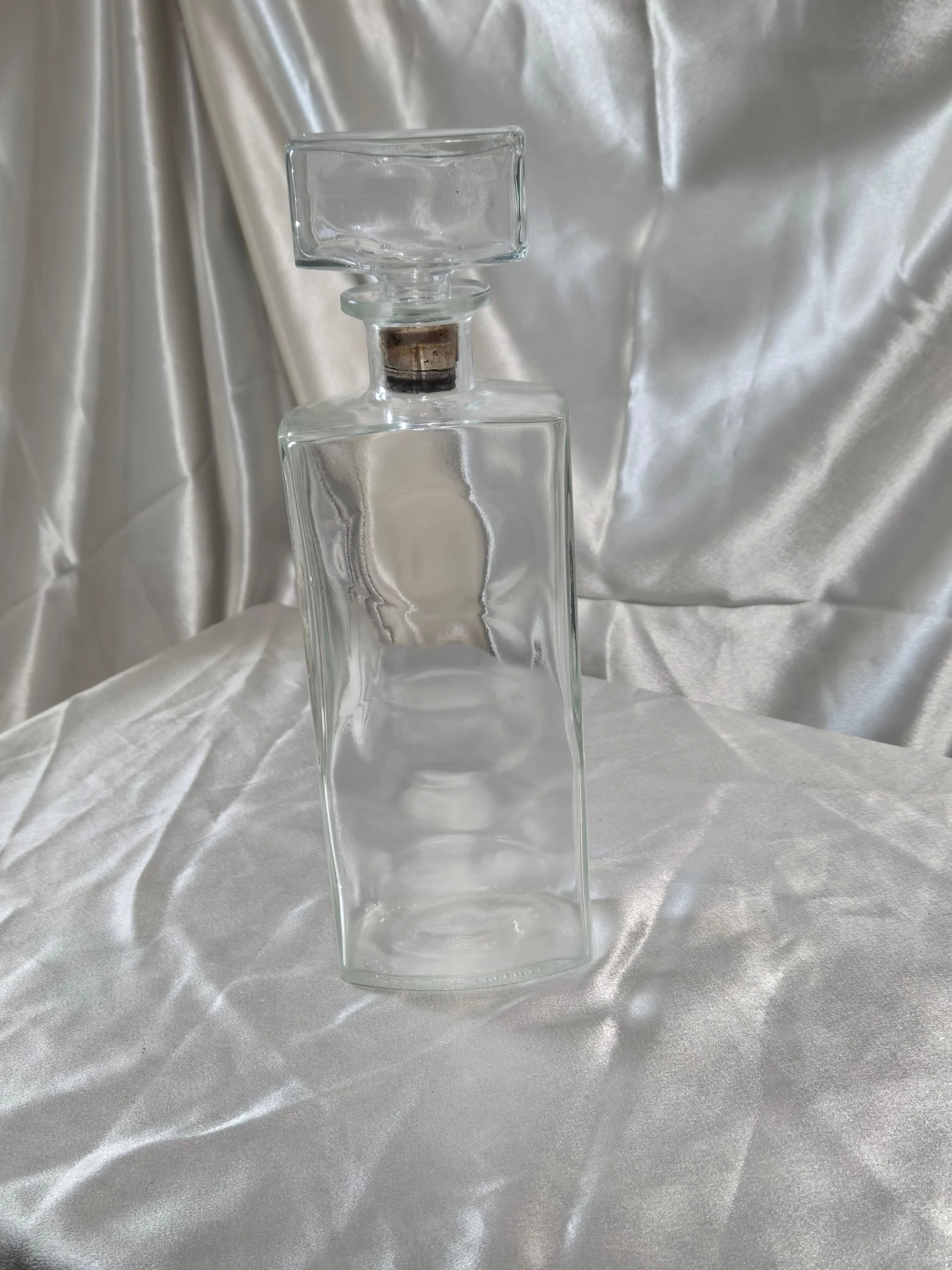 IW Harper clear glass decanter with stopper, front view