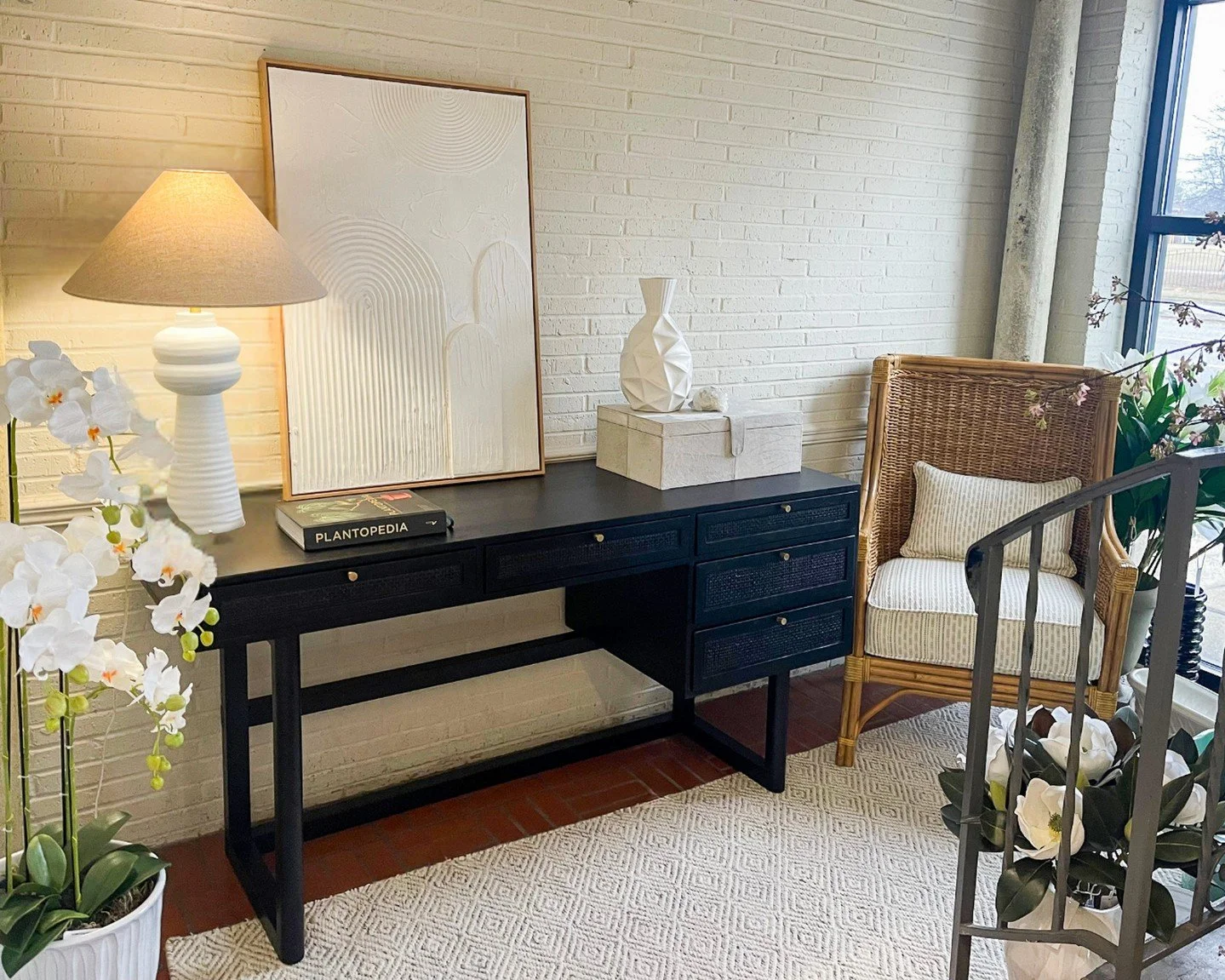 A quiet corner that speaks volumes.

Soft whites, warm woven details, and a touch of contrast create a space that feels calm, collected, and effortlessly elevated. It&rsquo;s proof that even the smallest moments in a room deserve thoughtful attention