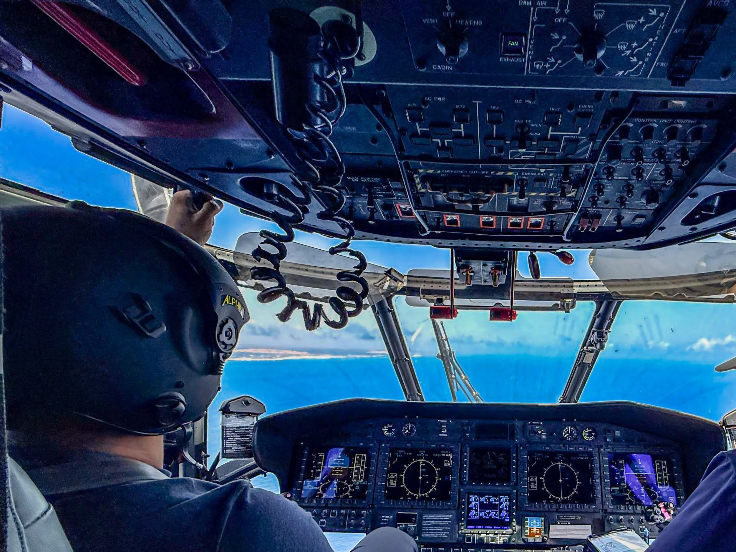 Kevin Padilla, veteran turned civilian contract pilot and founder of Aerovis drone solutions, in the cockpit during a contracted flight mission post-military service.