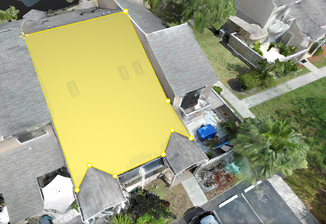 Drone view of a residential roof with highlighted roof measurement area for inspection and roofing estimate