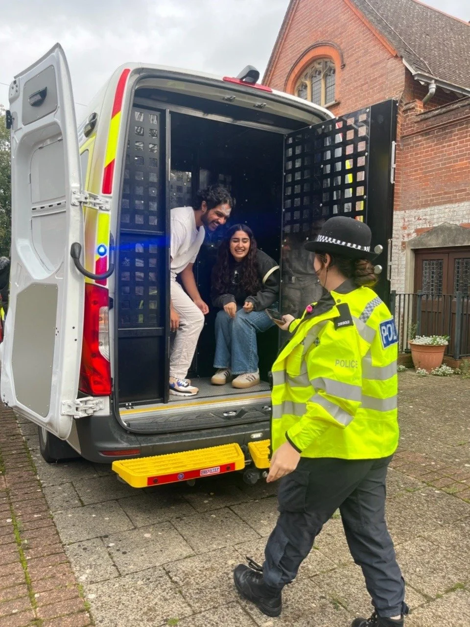 The local police bring their van along for people to explore