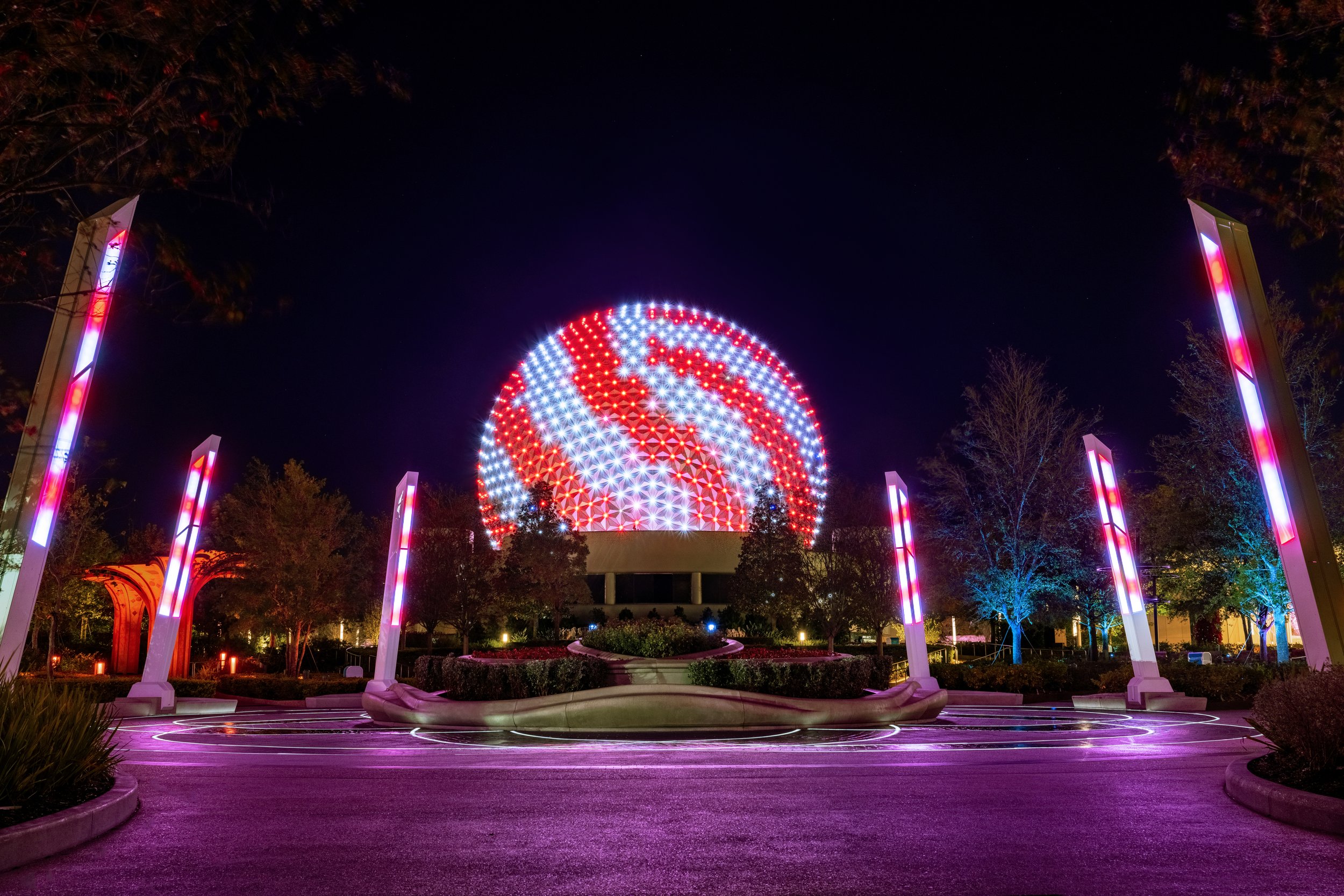 Spaceship Earth in EPCOT decorated for the holidays.