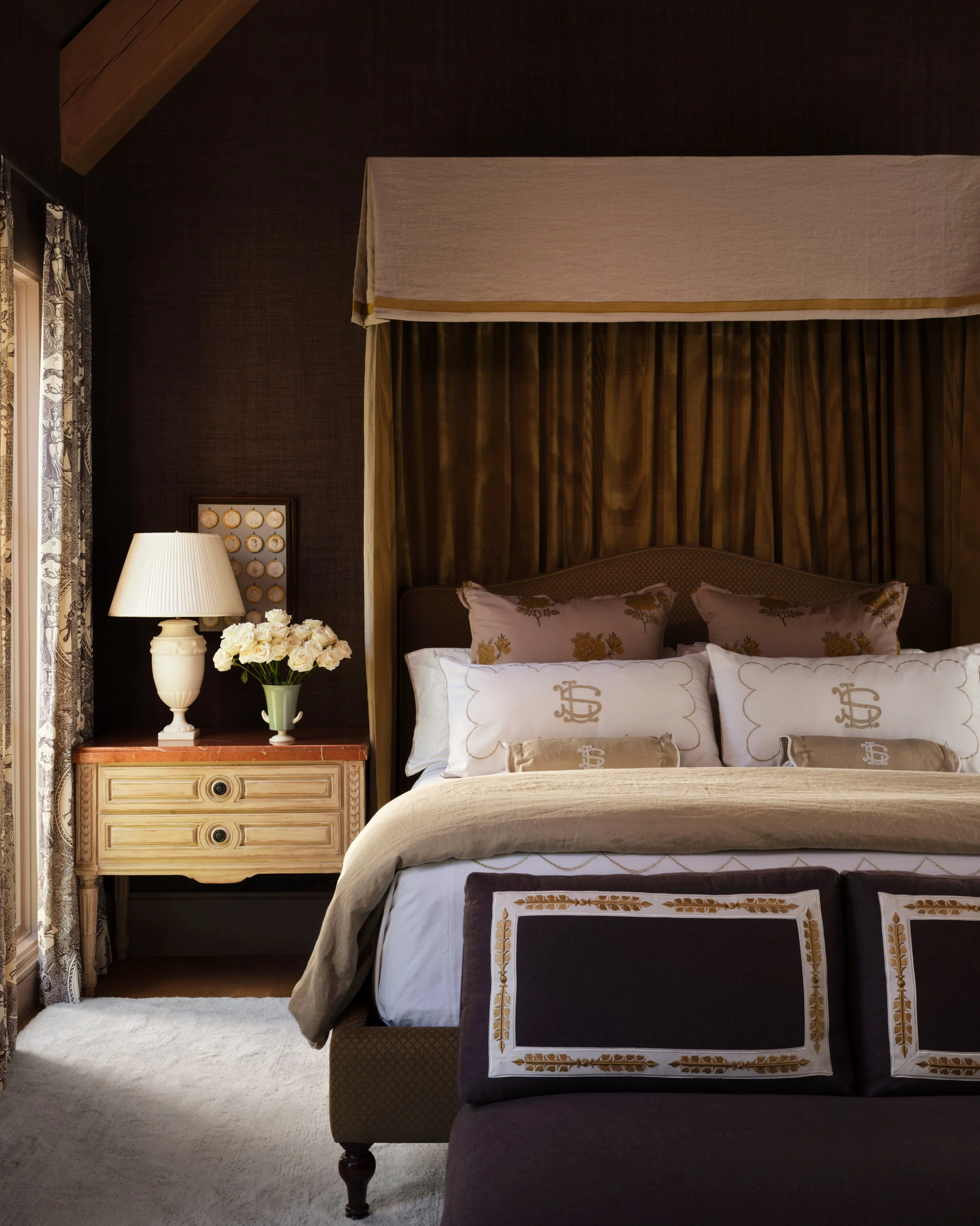 Plum, ochre and lavender create a moody cocoon in this primary bedroom &amp; office suite, where our assignment was to merge "his" avant-garde style with "her" lighter more ladylike inclinations.

Our process involves much foragin