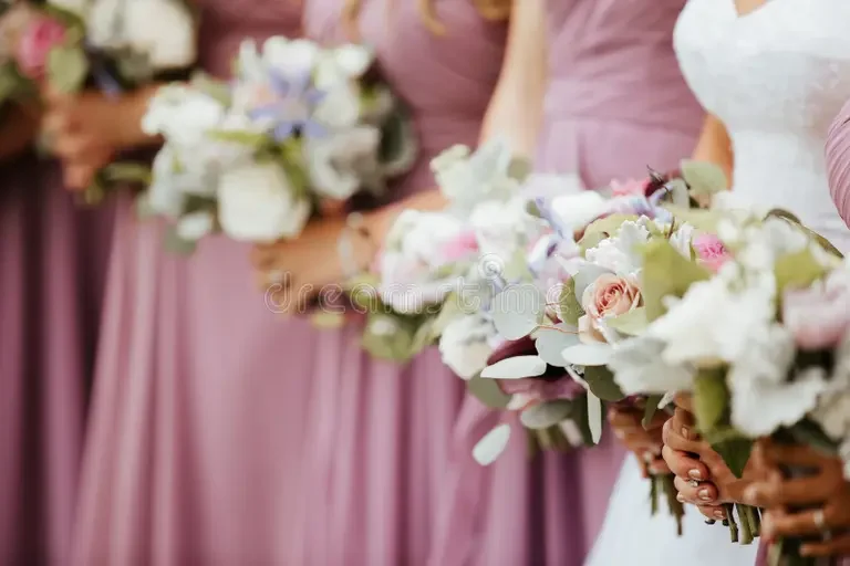 bridesmaids-pink-vioilet-dresses-holding-floral-arrangements-close-up-bridal-party-bouquets-224037472.webp