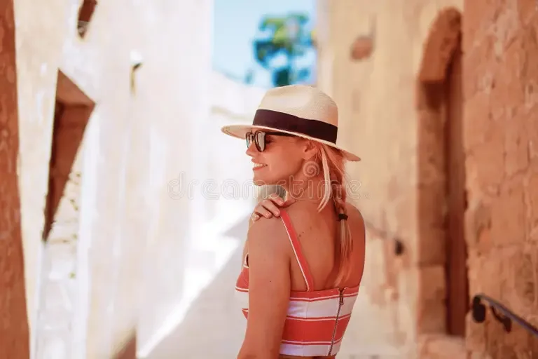 young-romantic-traveler-positive-woman-hat-mediterranean-street-young-romantic-traveler-woman-hat-mediterranean-street-166117235.webp