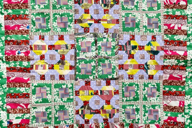 handmade-motley-patchwork-quilt-textile-background-283538466.webp