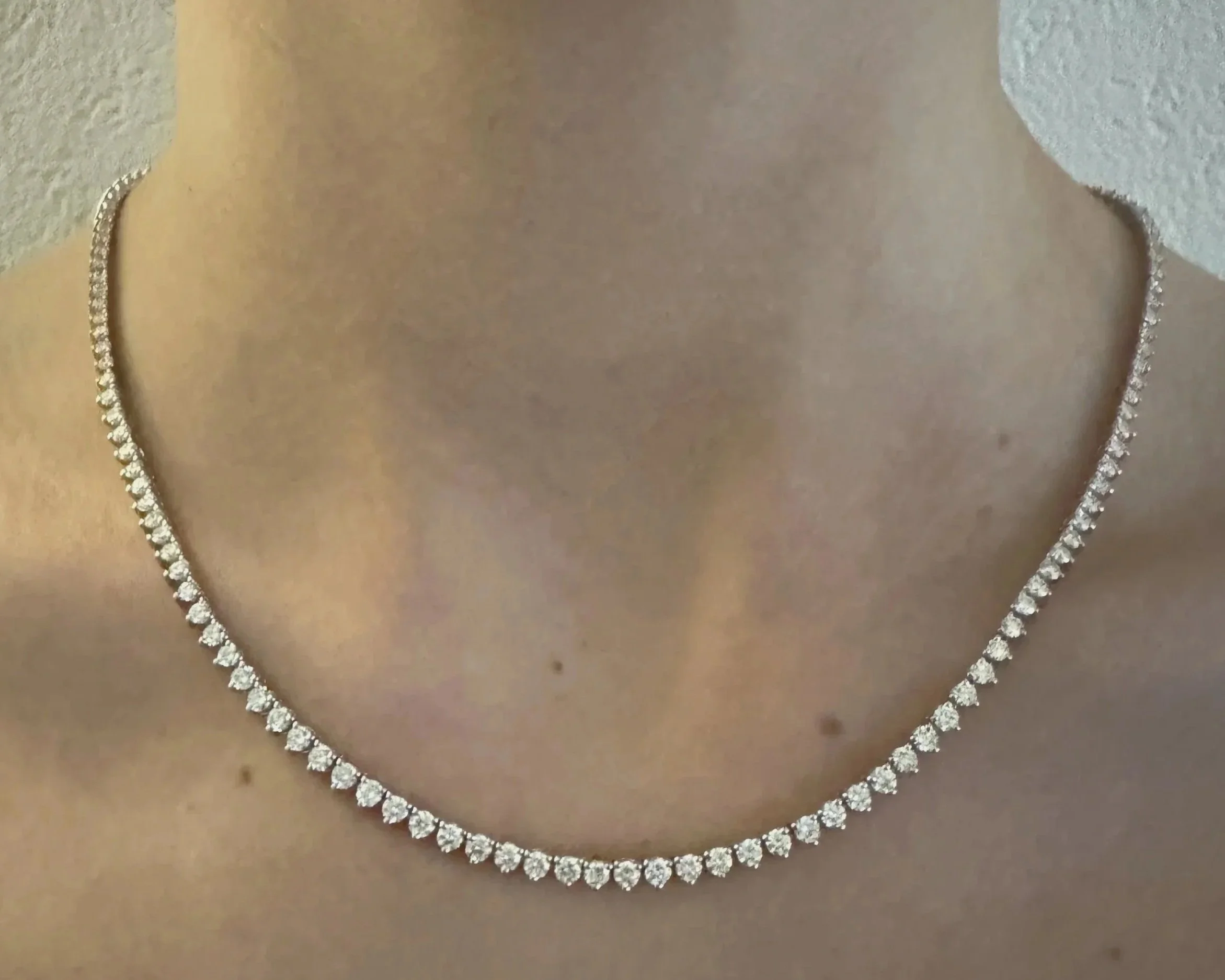 Isola graduated diamond tennis necklace in 14ct gold, featuring hand-selected lab-grown diamonds in a fluid silhouette — modern, sculptural, and refined.