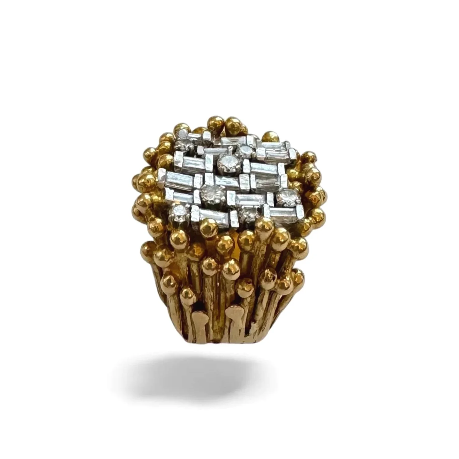 Front view of sculptural vintage 18K gold diamond ring with elevated textured band
