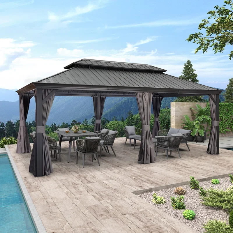 Outdoor patio with a black gazebo, dining table, chairs, and lounge seating, overlooking mountains and a swimming pool.