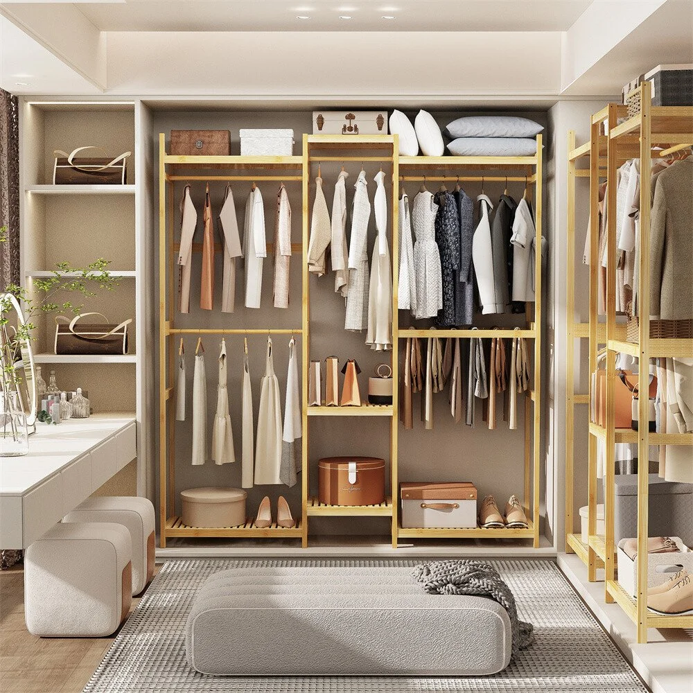 Clothing organized in a modern wardrobe with shelves and hanging rods, with shoes, bags, and decorative items.