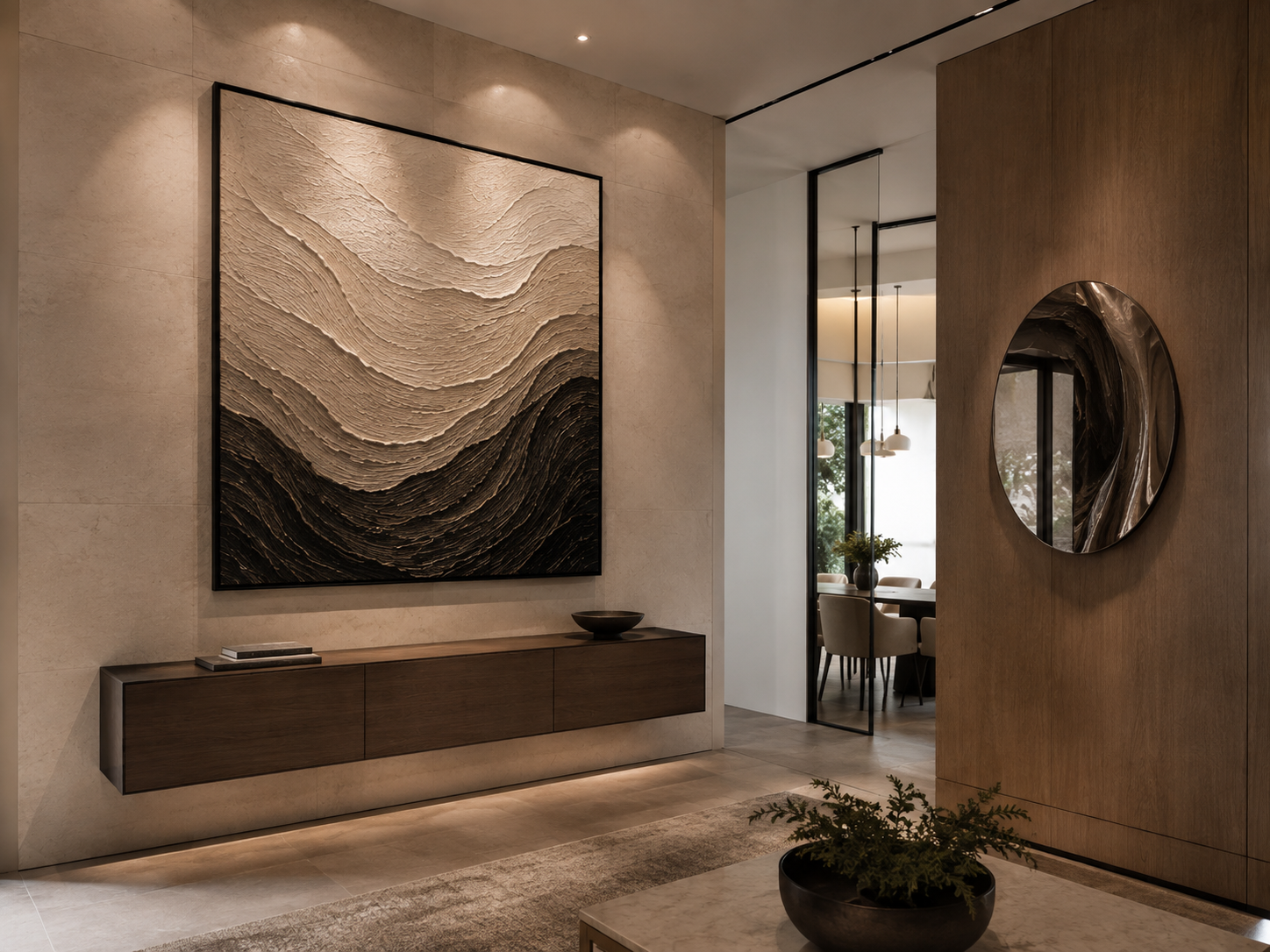 Luxury interior featuring professionally installed oversized artwork and a sculptural mirror on finished stone and wood walls.