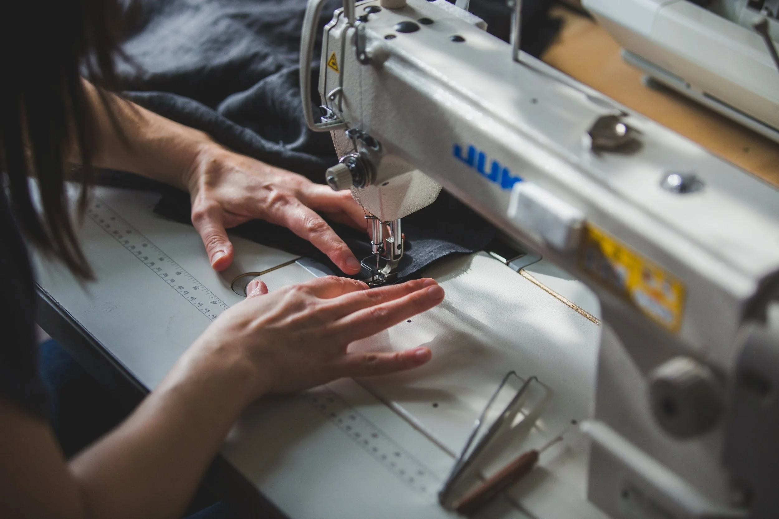 sewing-some-fabric-with-machine.jpg
