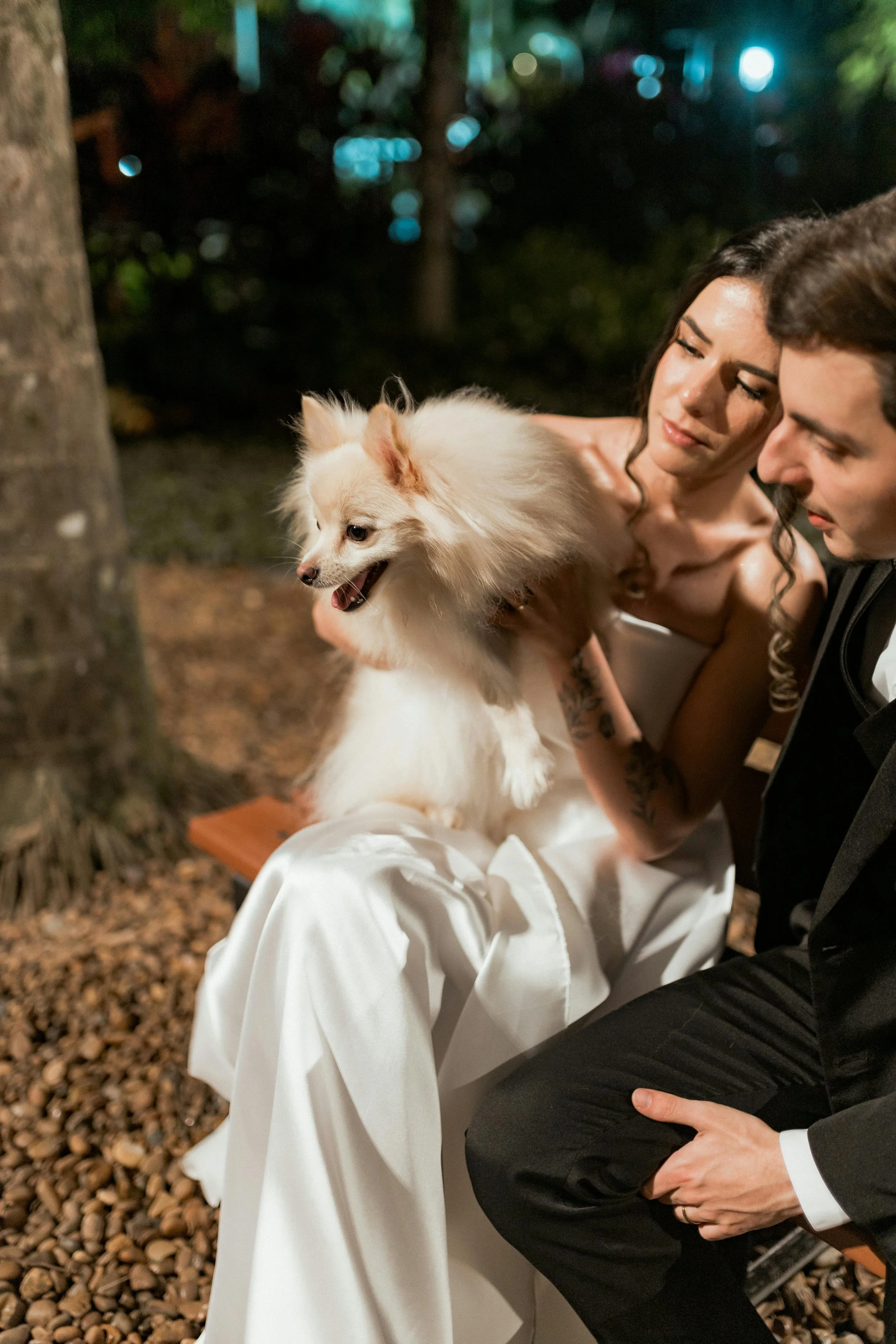 Happy wedding couple with dog