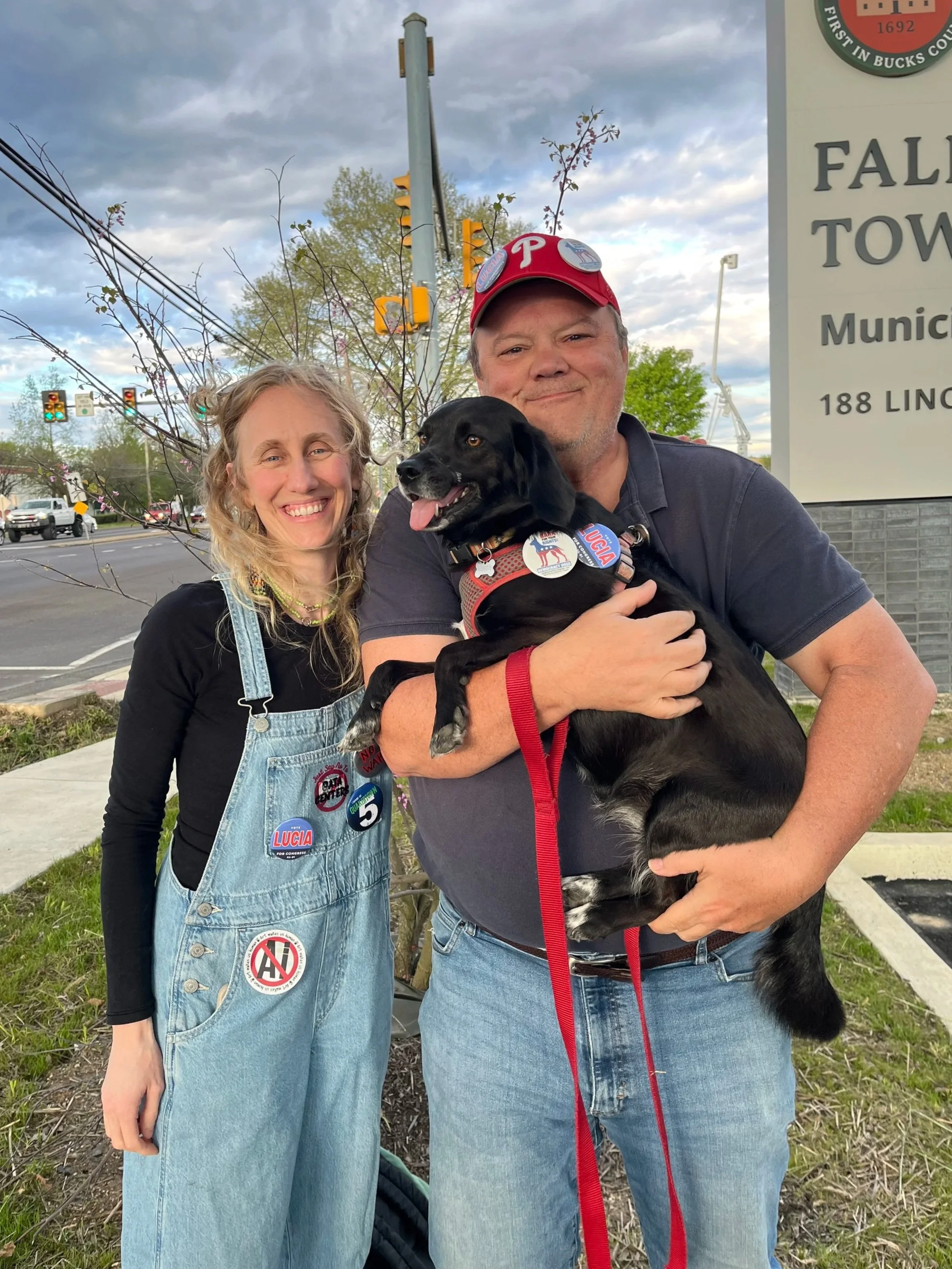 Congressional candidate Lucia Simonelli with Rob Strickler and Nessie the dog.