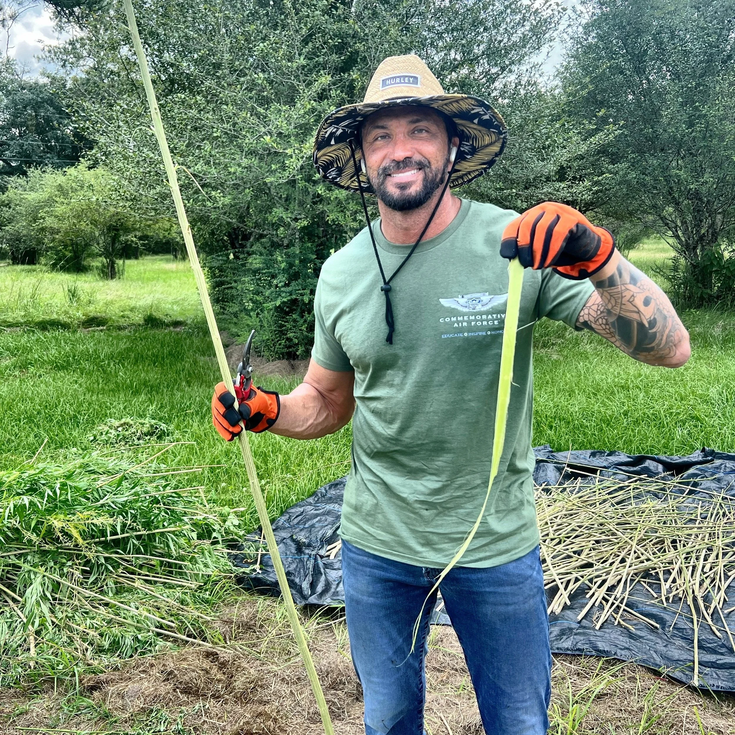 Grower and our Delta's CEO, Shawn Ledig, showing the beautiful fiber from a local harvest