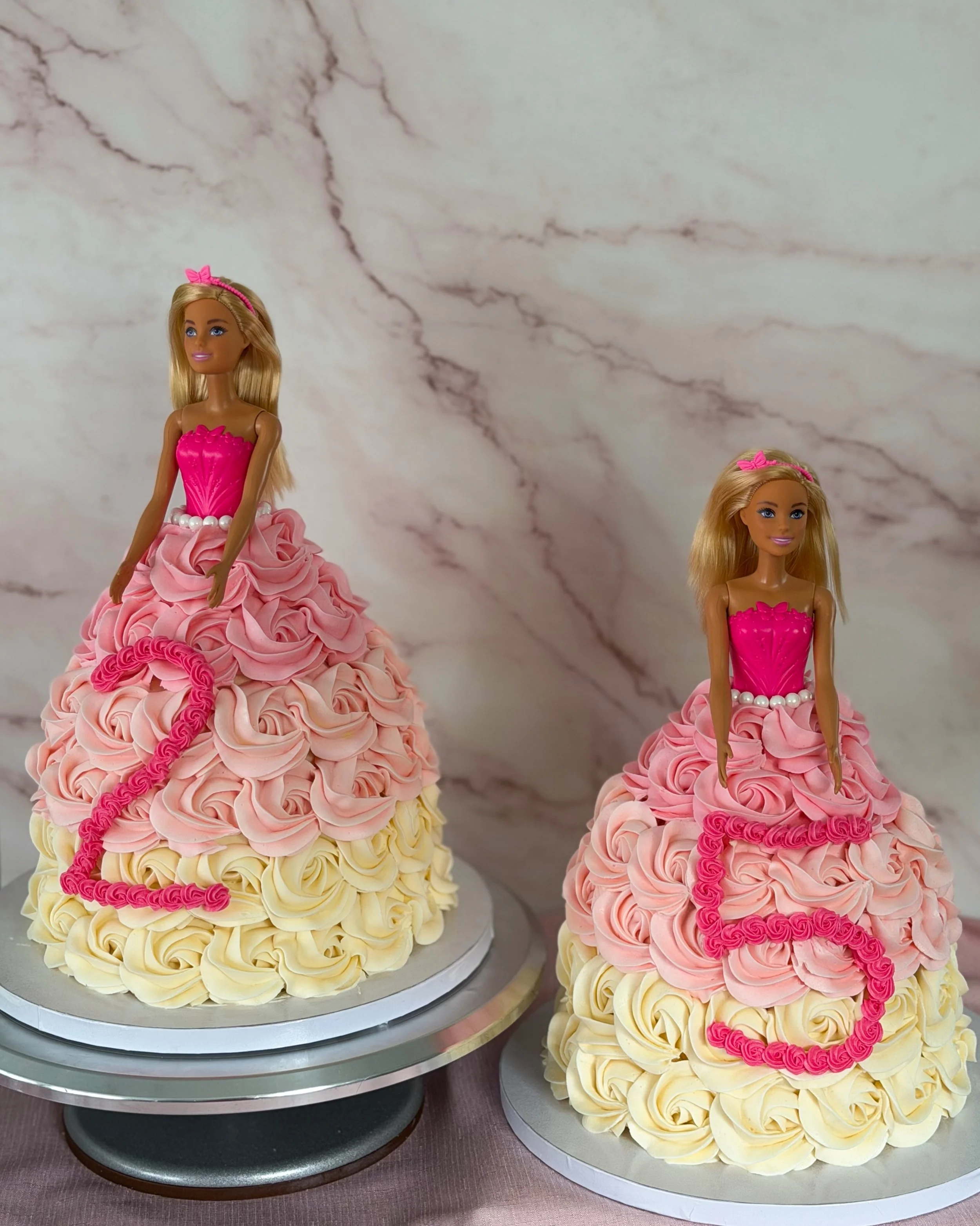 Two Barbie cakes are better than one!!🩷🎀

#barbiecake #nashvillecustomcake #nashvillebakery #birthdaycake #barbiedresscake