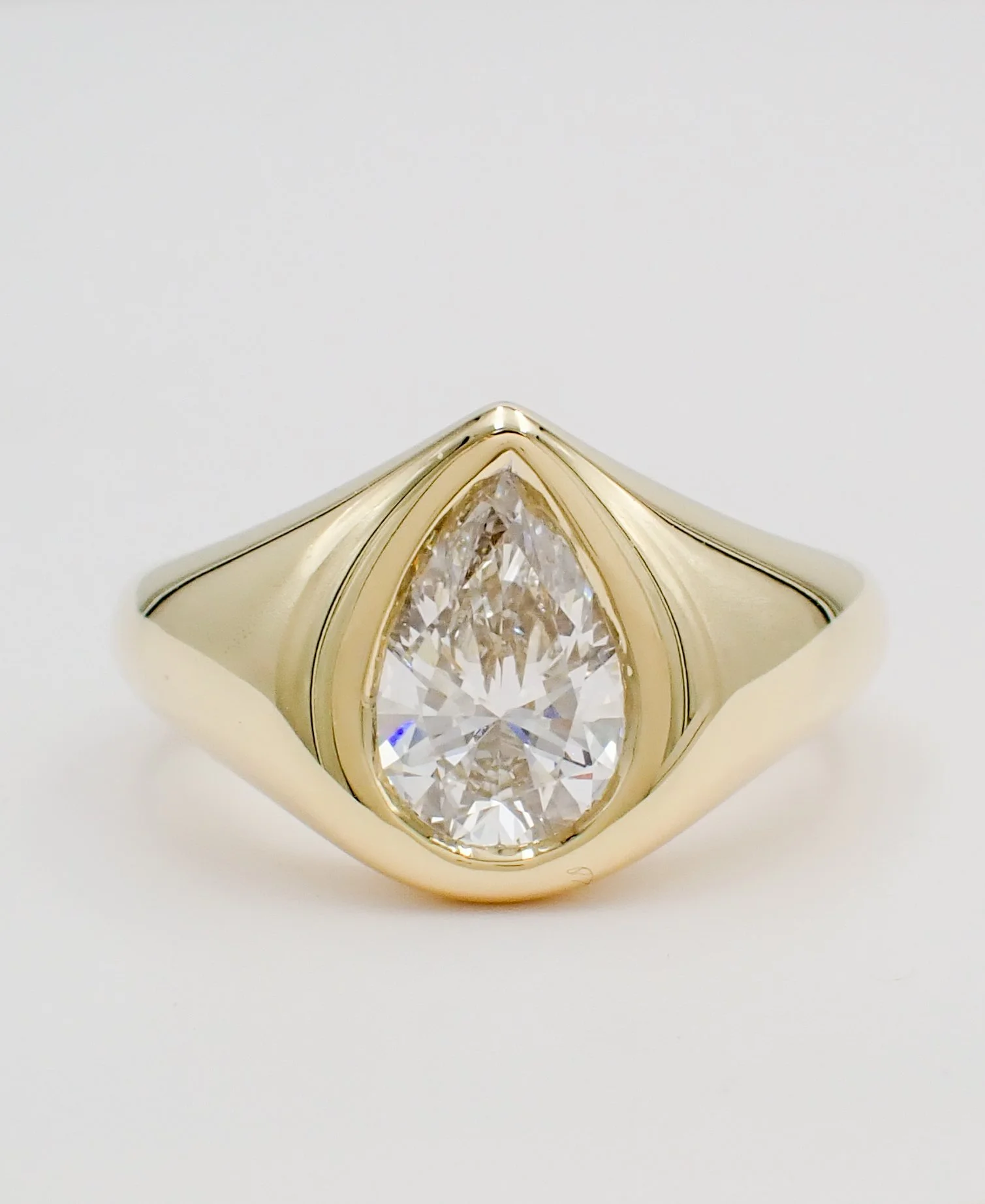 Pear shape diamond heavy set signet engagement ring.jpg