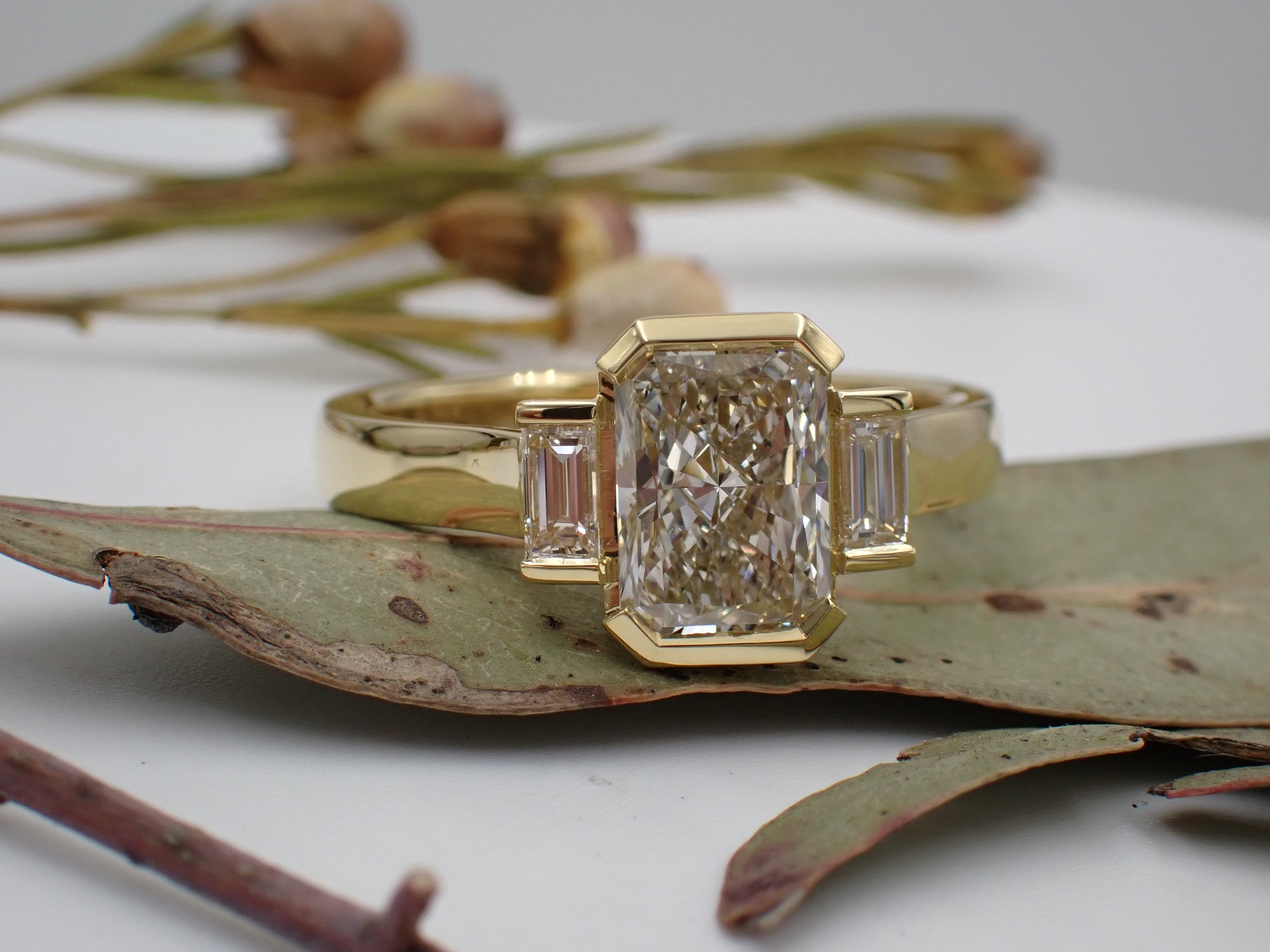 A ‘trilogy’ (three stone ring) 