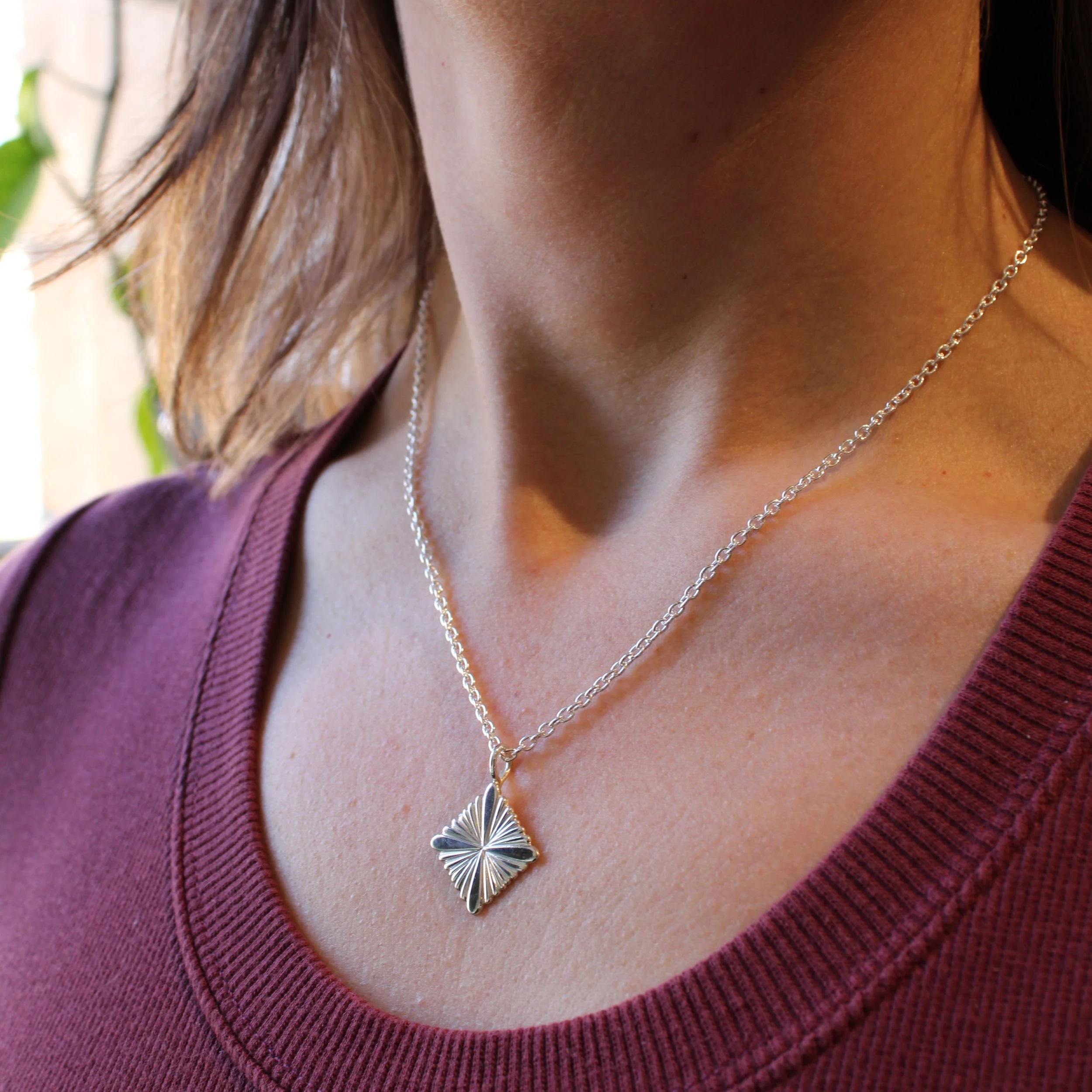 Sunburst+Offset+Square+Necklace.png