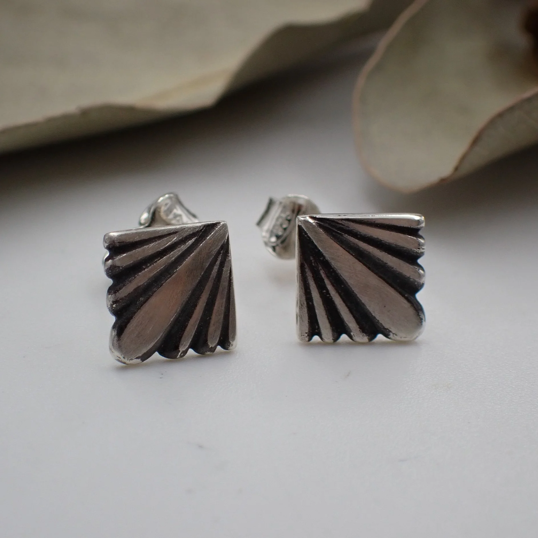 Sunburst+Blackened+Stud+earrings.png