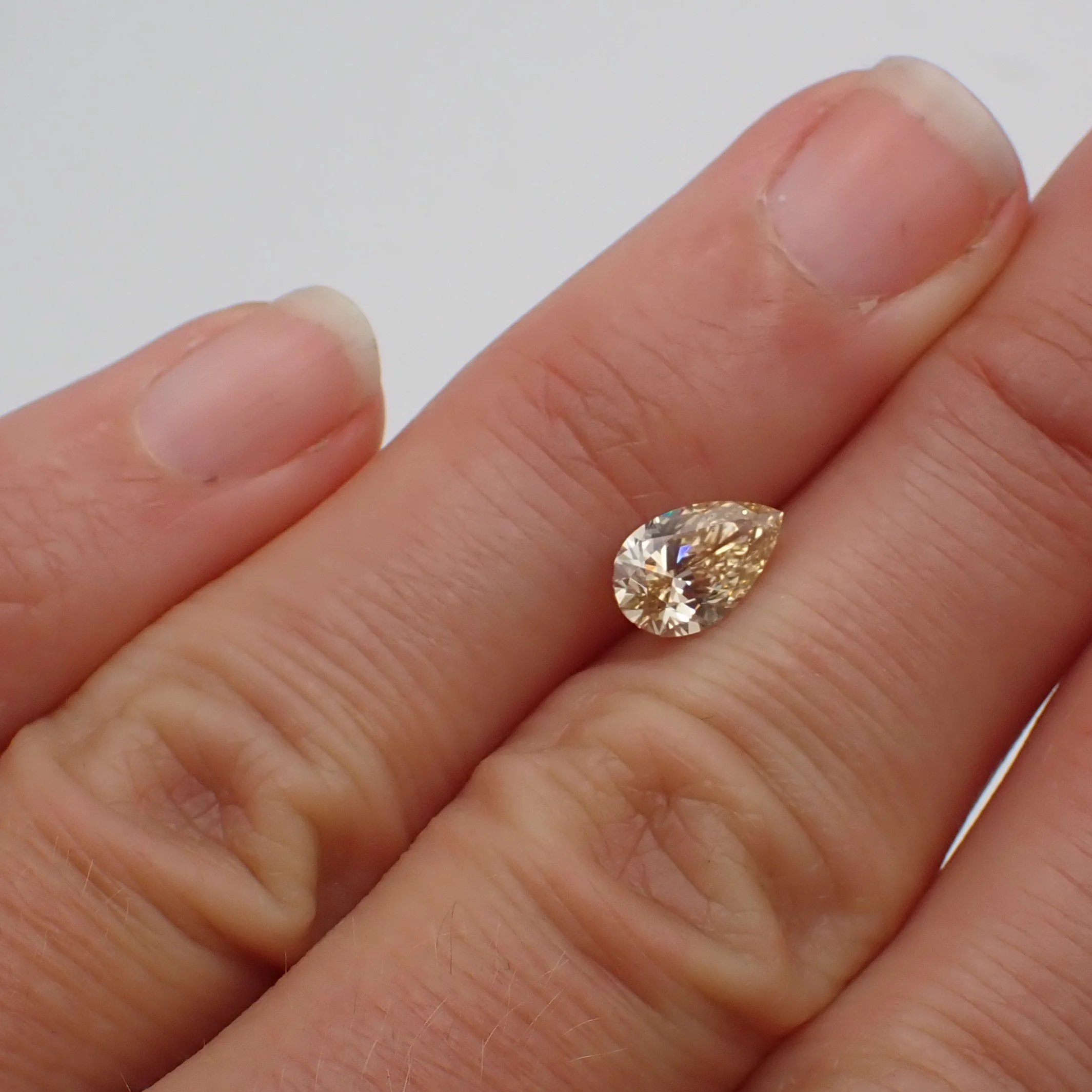 recycled-champagne-diamond-pear-cut-1.00ct-scale.JPG